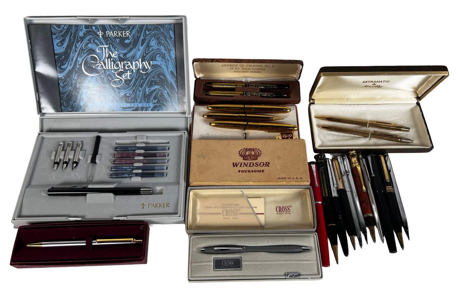 Vintage Pens & Mechanical Pencils - Parker, Cross: Lot includes vintage pens and mechanical pencils from Parker, Cross, Windsor, and others. Highlights include a boxed Parker Calligraphy Set with nibs and ink, a matte gray Cross ballpoint in case,
