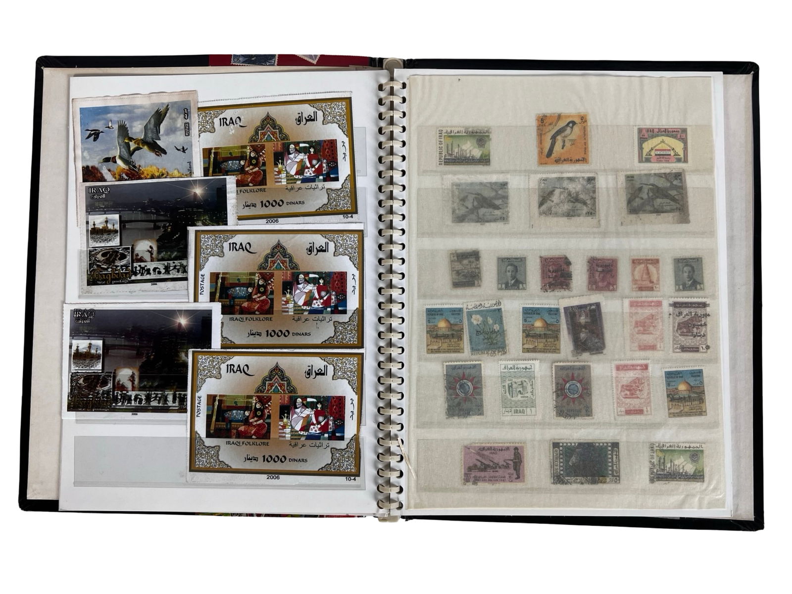 Iraqi & Middle Eastern Stamps in Album: Stamp album containing an extensive collection of Iraqi and regional Middle Eastern postage stamps dating from the mid-20th century through early 21st century. Includes both used and unused examples,