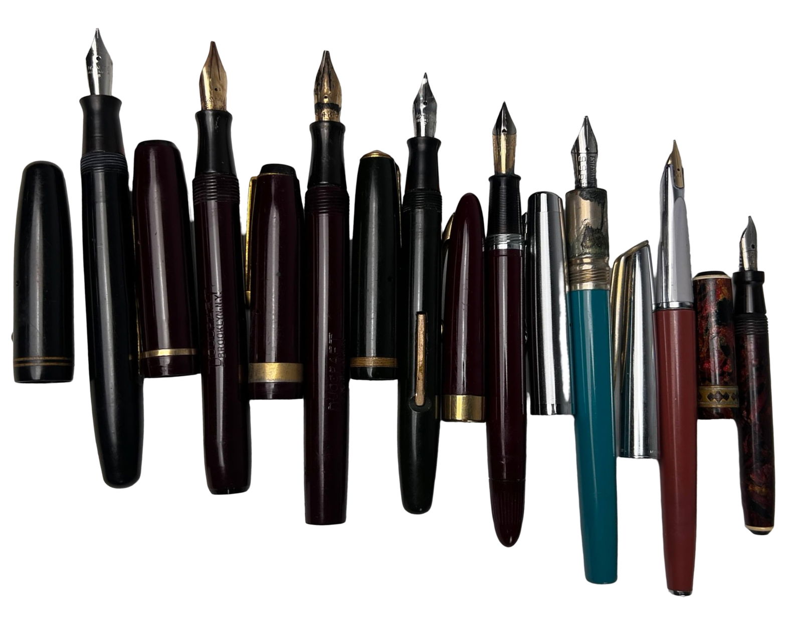 Antique and Vintage Fountain Pens with 14K Nibs: This assorted collection of antique and vintage fountain pens features a range of classic American makers, representing both everyday writers and higher quality examples with gold nibs. Included in