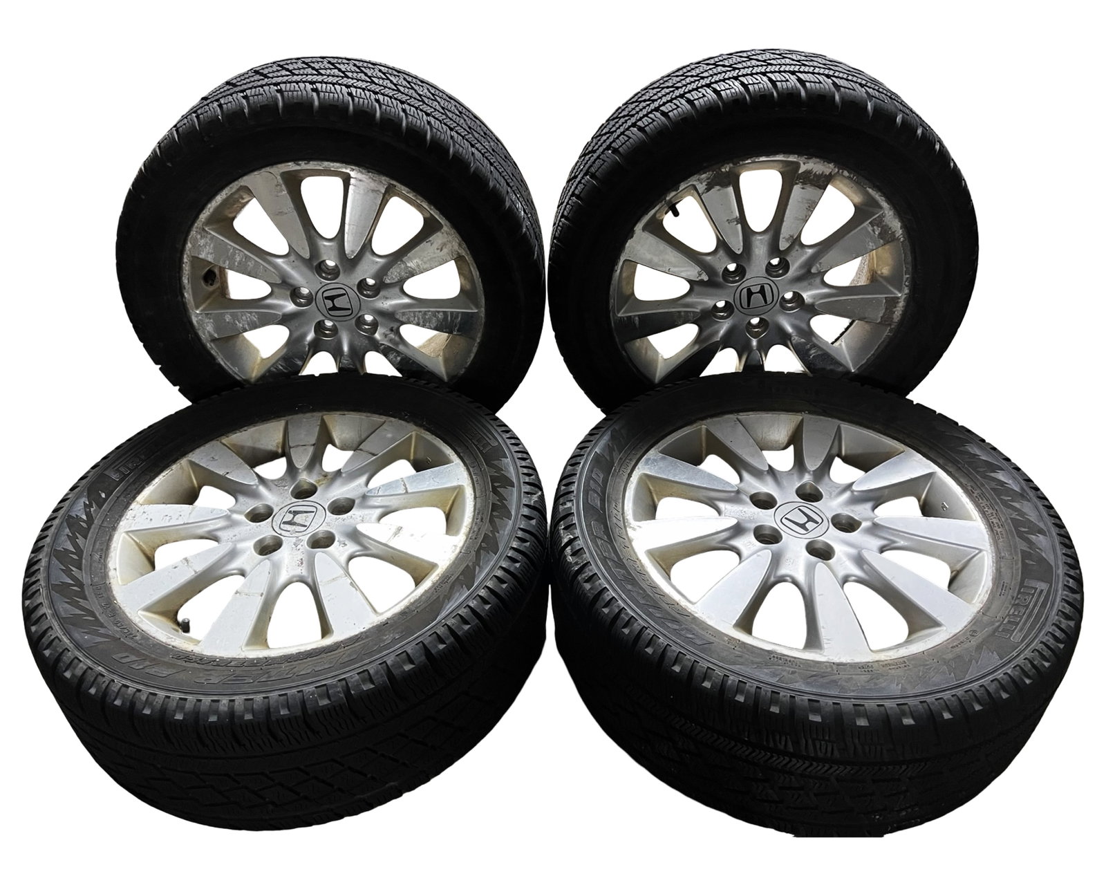 Set of 4 Pirelli Tires with Honda Alloy Rims: Set of four gently used Pirelli tires, size 245/50 R17. Come with Honda Alloy Rims.