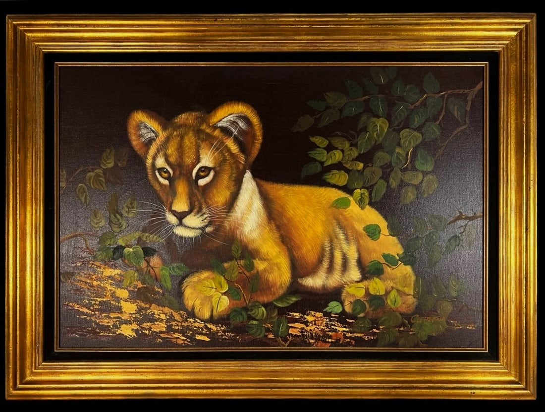 Lion Cub - Realistic Oil Painting by Cutrona: A striking oil painting on canvas depicting a lion cub resting among foliage, executed in a realistic style by the artist Cutrona. The cub's intense gaze and finely detailed features are highlighted a
