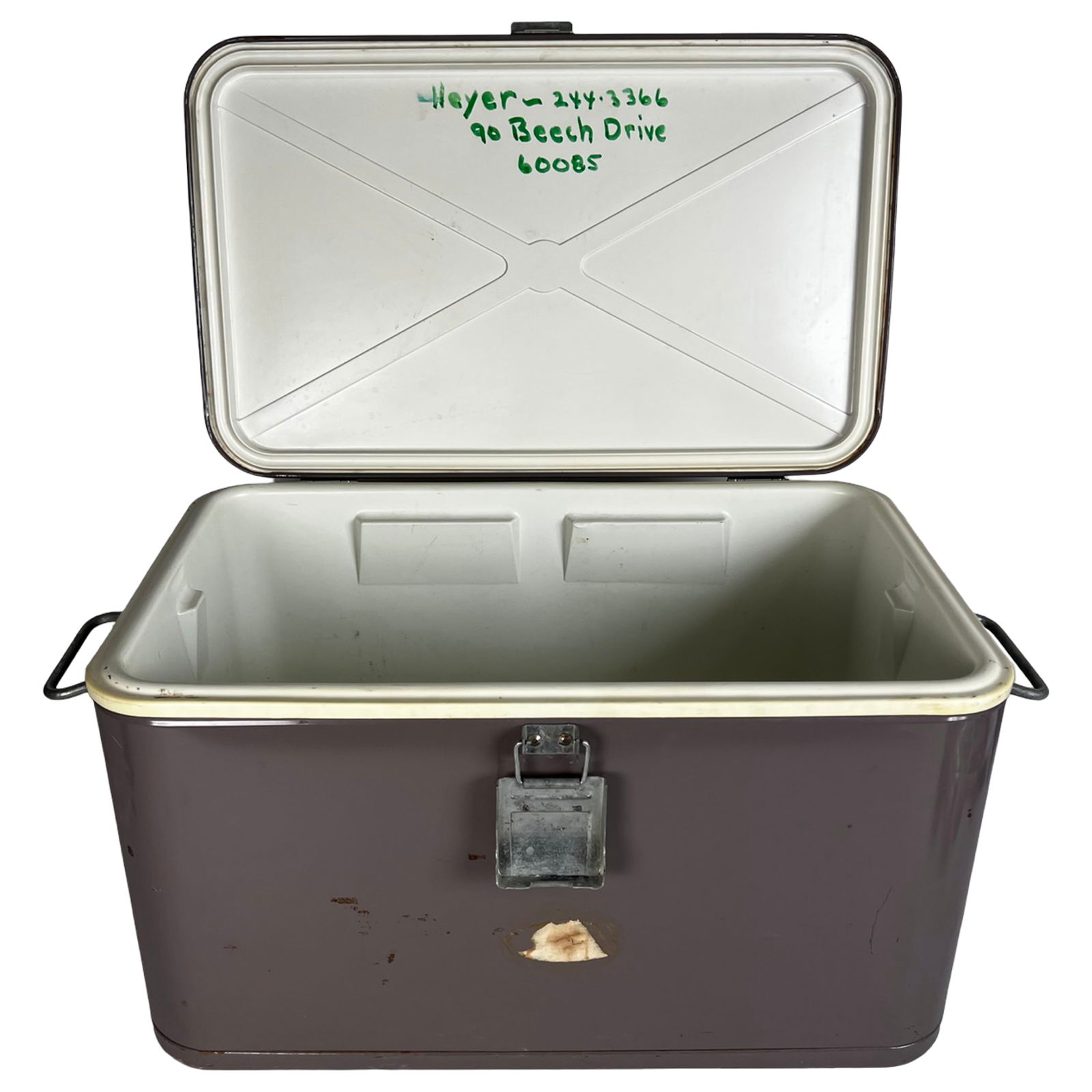 1950s Coleman Steel Belted Cooler: Classic mid-century Coleman steel belted cooler from the 1950s, featuring a sturdy metal exterior in deep brown with a cream trim and galvanized steel latch and side handles. The cooler has a