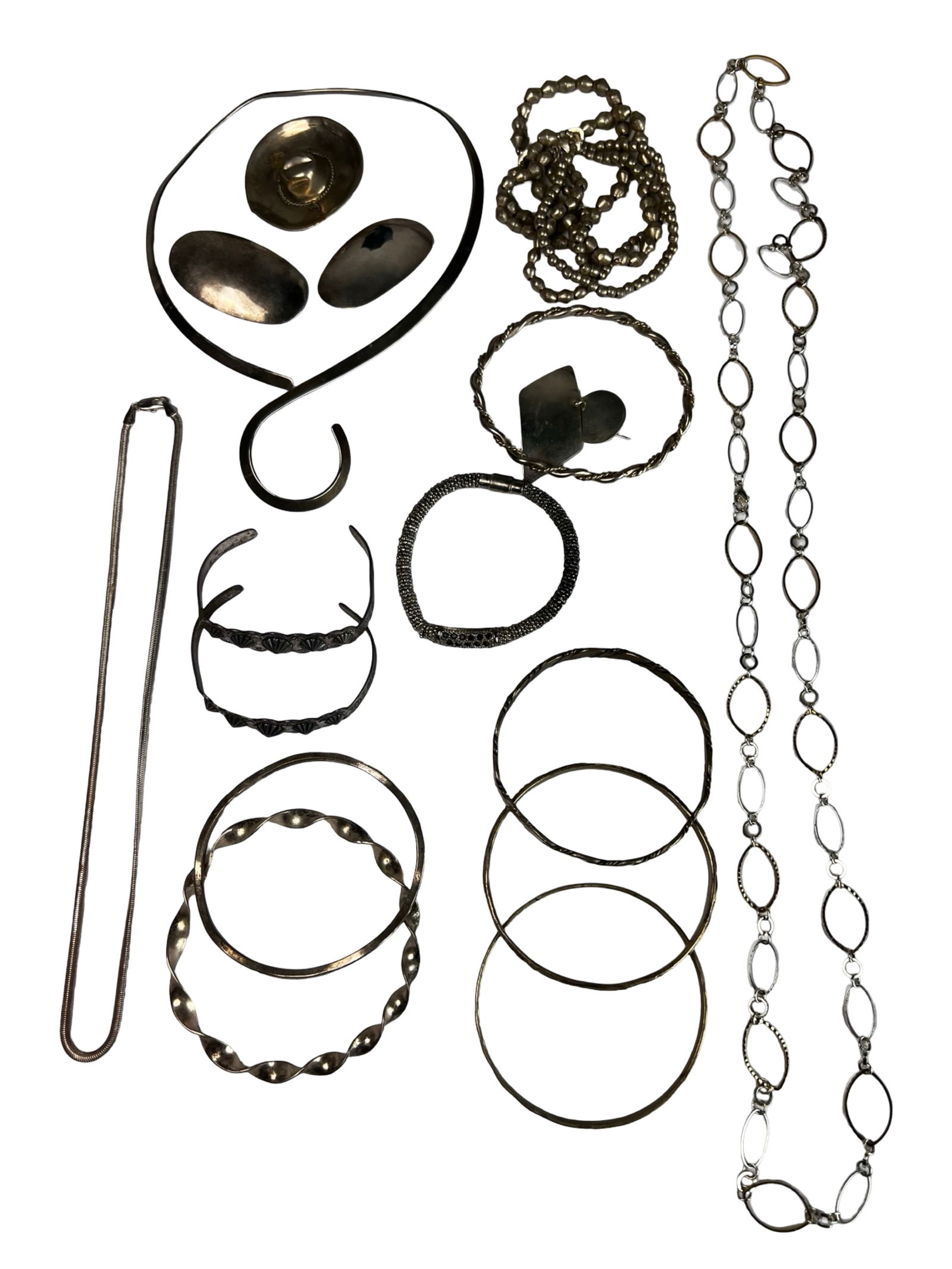 Vintage Silver-Tone Jewelry- Necklaces, Bracelets: Attractive assortment of vintage silver-tone jewelry featuring a diverse mix of wearable pieces. The group includes chain and link necklaces, beaded strands, bangles, cuffs, and bracelets in a variety