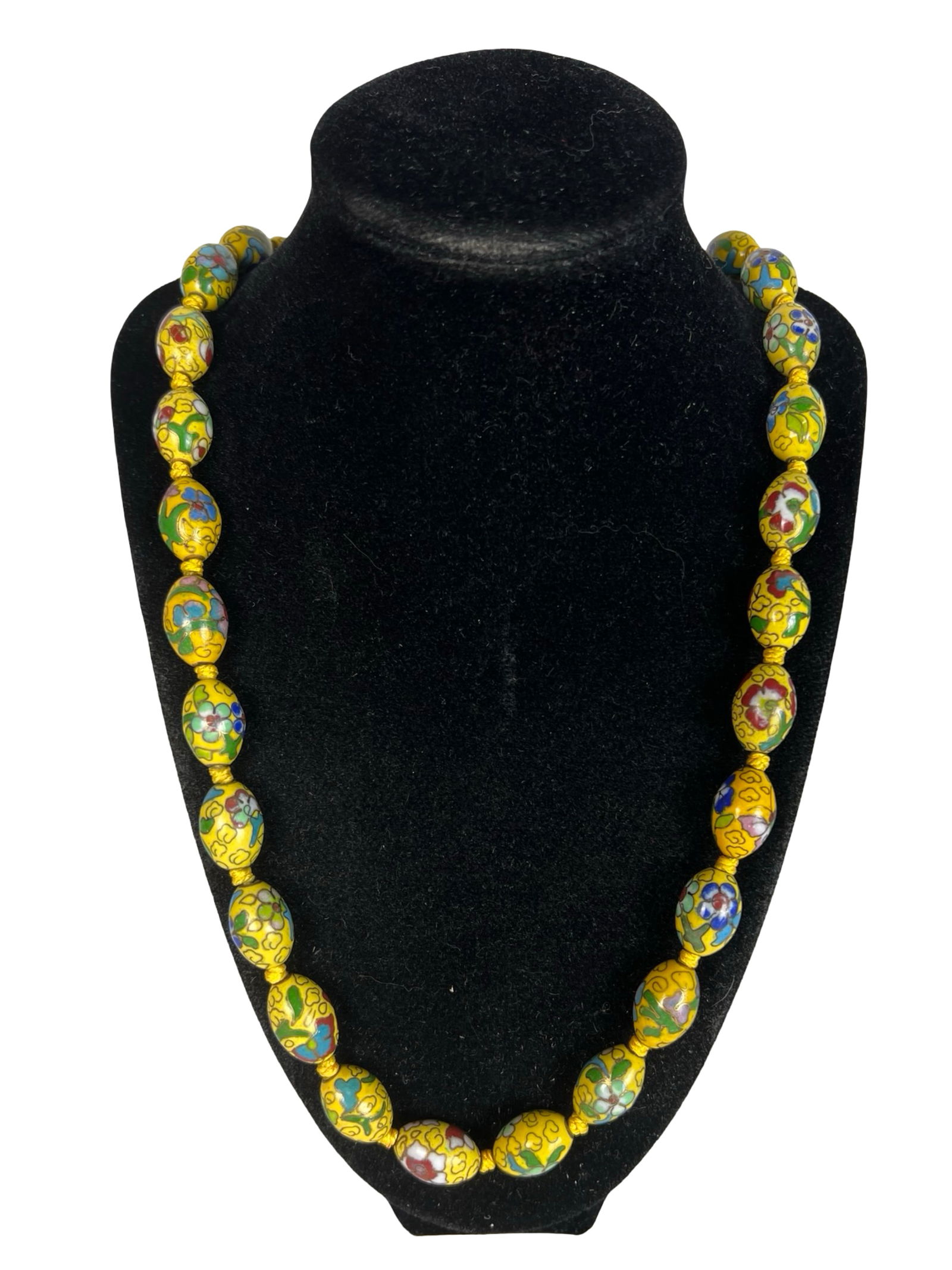 Antique Chinese Cloisonne Enamel Bead Necklace: Antique Chinese cloisonne enamel bead necklace featuring hand decorated metal beads with colorful floral and scrolling motifs on a yellow ground. The beads are individually knotted and finished with a