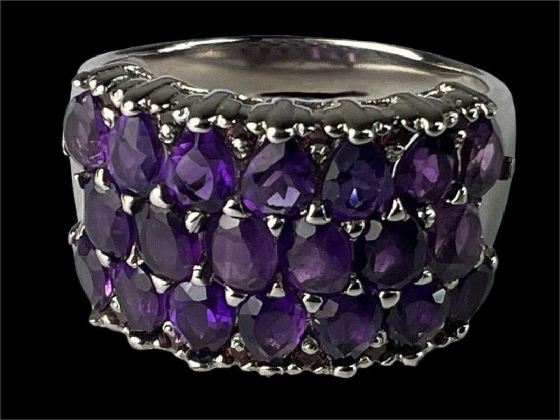 Natural Amethyst & Rhodolite Garnet Sterling Ring: Striking and elegant, this lady's cocktail ring features a bold mosaic of deep purple natural unheated Uruguay amethysts, accented with sparkling rhodolite garnets. The gemstones are prong set in a wi