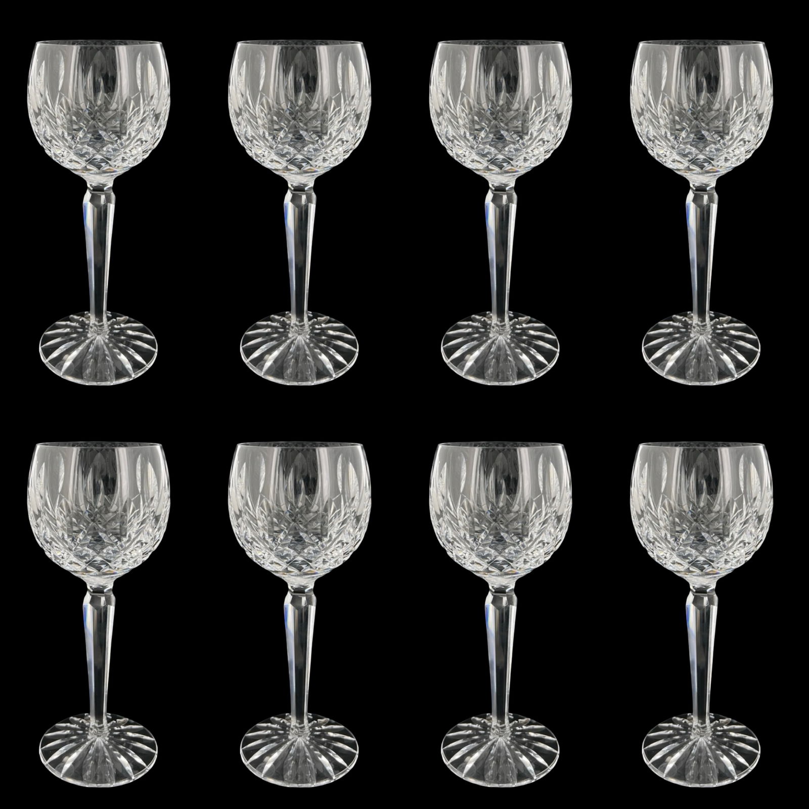 Waterford Crystal Lismore Wine Hock Glasses- 8: Elegant set of eight Waterford Crystal wine hock glasses in the classic Lismore pattern. Each glass features the iconic deep diamond and wedge cuts that catch and reflect light beautifully, paired