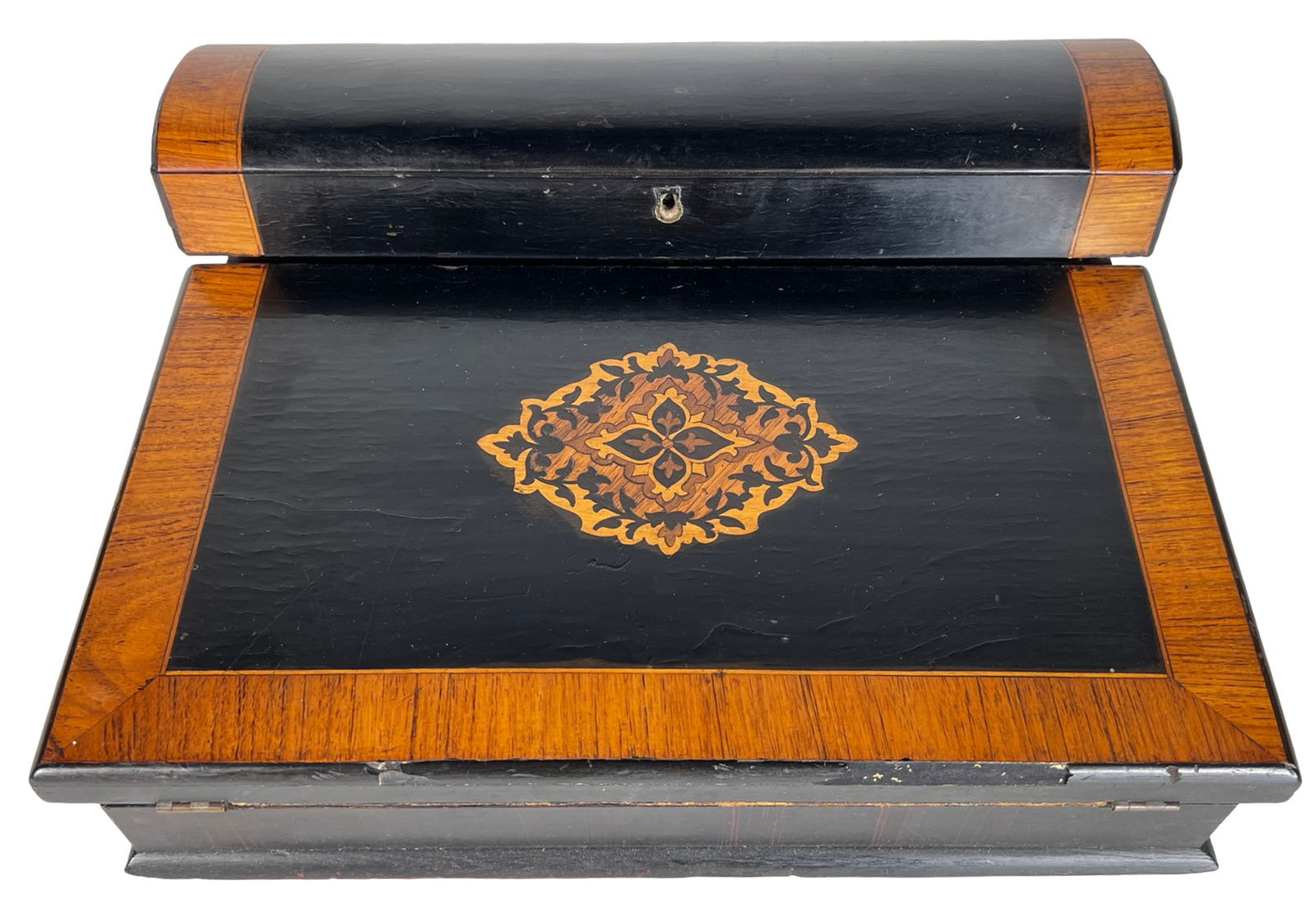 Antique Burl Walnut Inlaid Writing Slope Box: This antique English writing slope box is crafted from richly figured burl walnut with contrasting dark ebonized panels and decorative inlaid detailing. The sloped hinged lid opens to reveal a