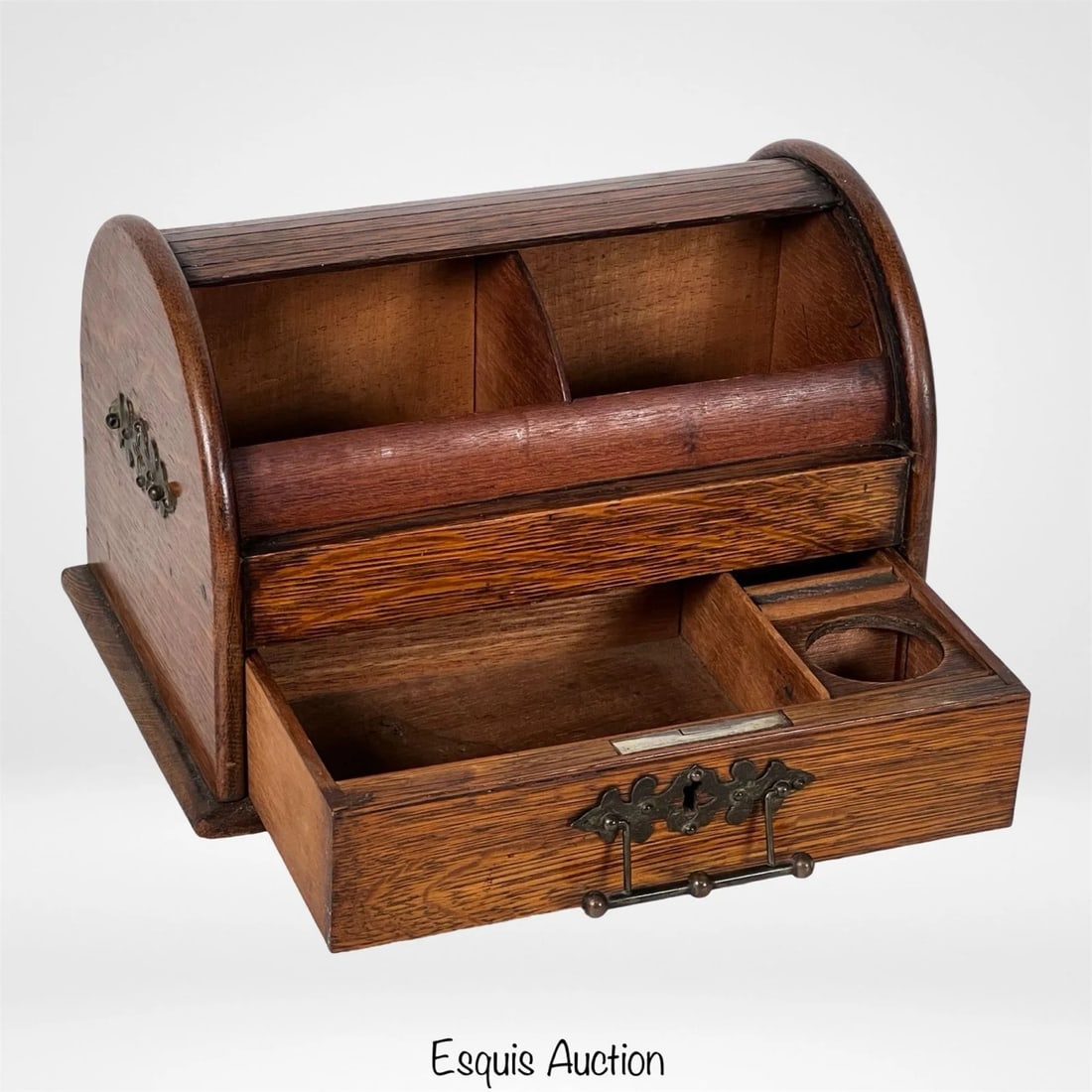 Antique Victorian Tambour Stationary Box Desk Tidy: This Victorian tambour-front stationery box is crafted from richly figured tiger oak and showcases a classic roll-top design. Opening the tambour reveals two upper storage compartments and a lower