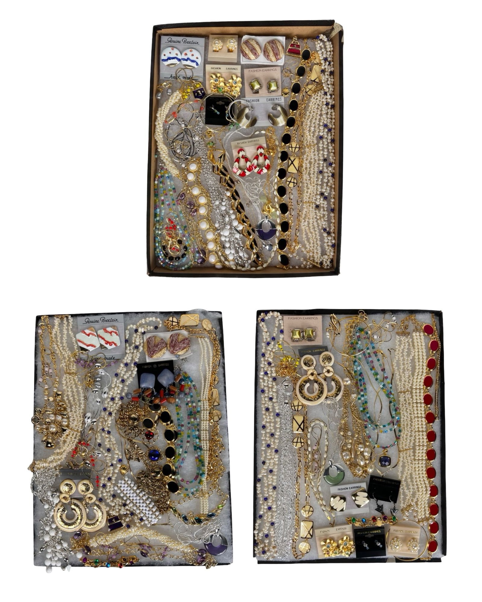 Assortment of Costume Jewelry: A vibrant selection of costume jewelry offering an eye-catching range of necklaces, earrings, bracelets, and other fashionable accents. This varied group provides plenty of shimmer and style for every