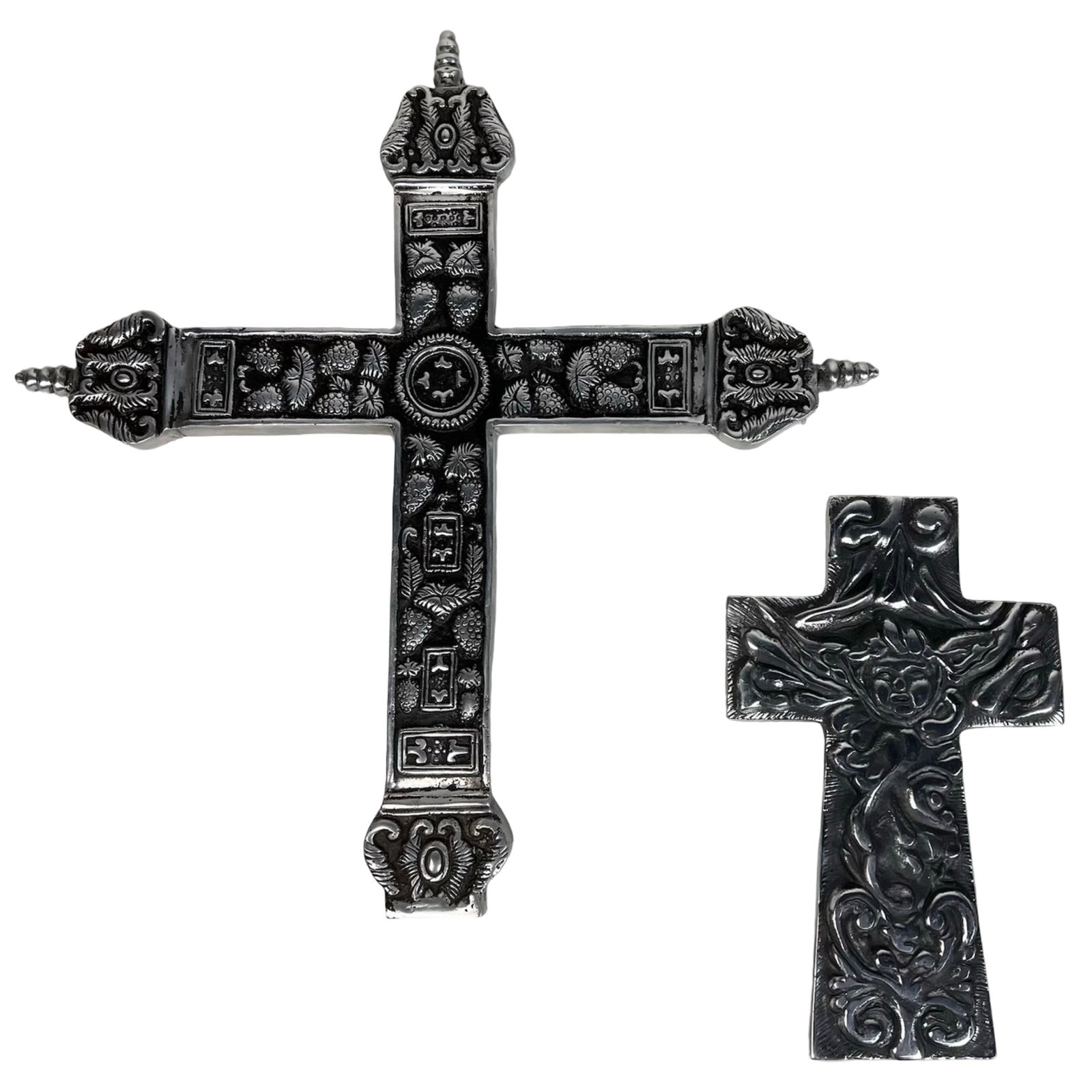 Home Decor - Embossed Crosses & Moroccan Mirror: Group of decorative home accents including two embossed aluminum wall crosses-one larger at approximately 20" x 19" and a smaller companion piece-each featuring detailed raised motifs. Also included