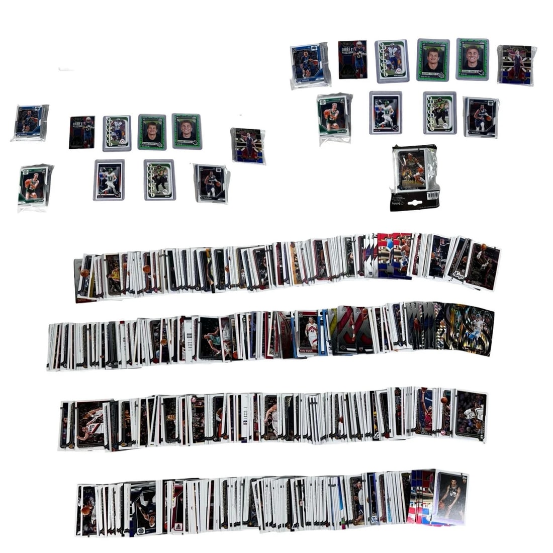 ixed Sports Card Collection - Mostly Basketball: Extensive lot of over 700 modern trading cards, primarily basketball, with a smaller mix of other sports. Includes rookies, stars, inserts, Prizm and Mosaic parallels, and a variety of special issues