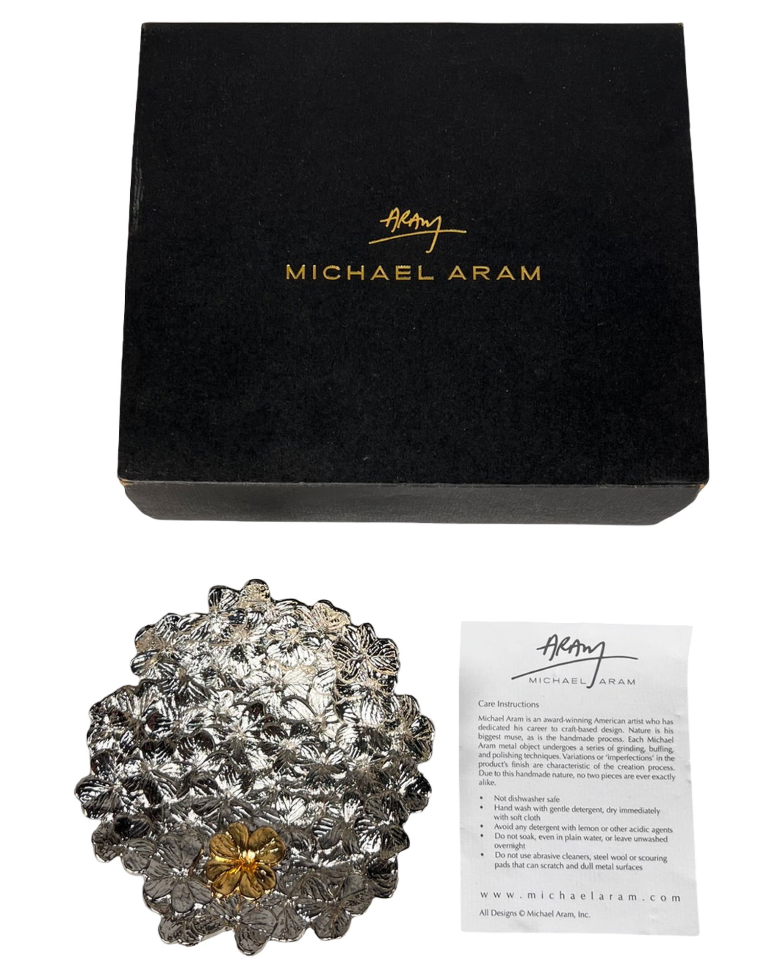 Michael Aram Clover Catch-All Trinket Bowl: Elegant Clover Catch-All Trinket Bowl by Michael Aram, featuring a sculptural field of clover leaves rendered in polished silver-tone metal with a contrasting gold-tone clover accent at center. The ri