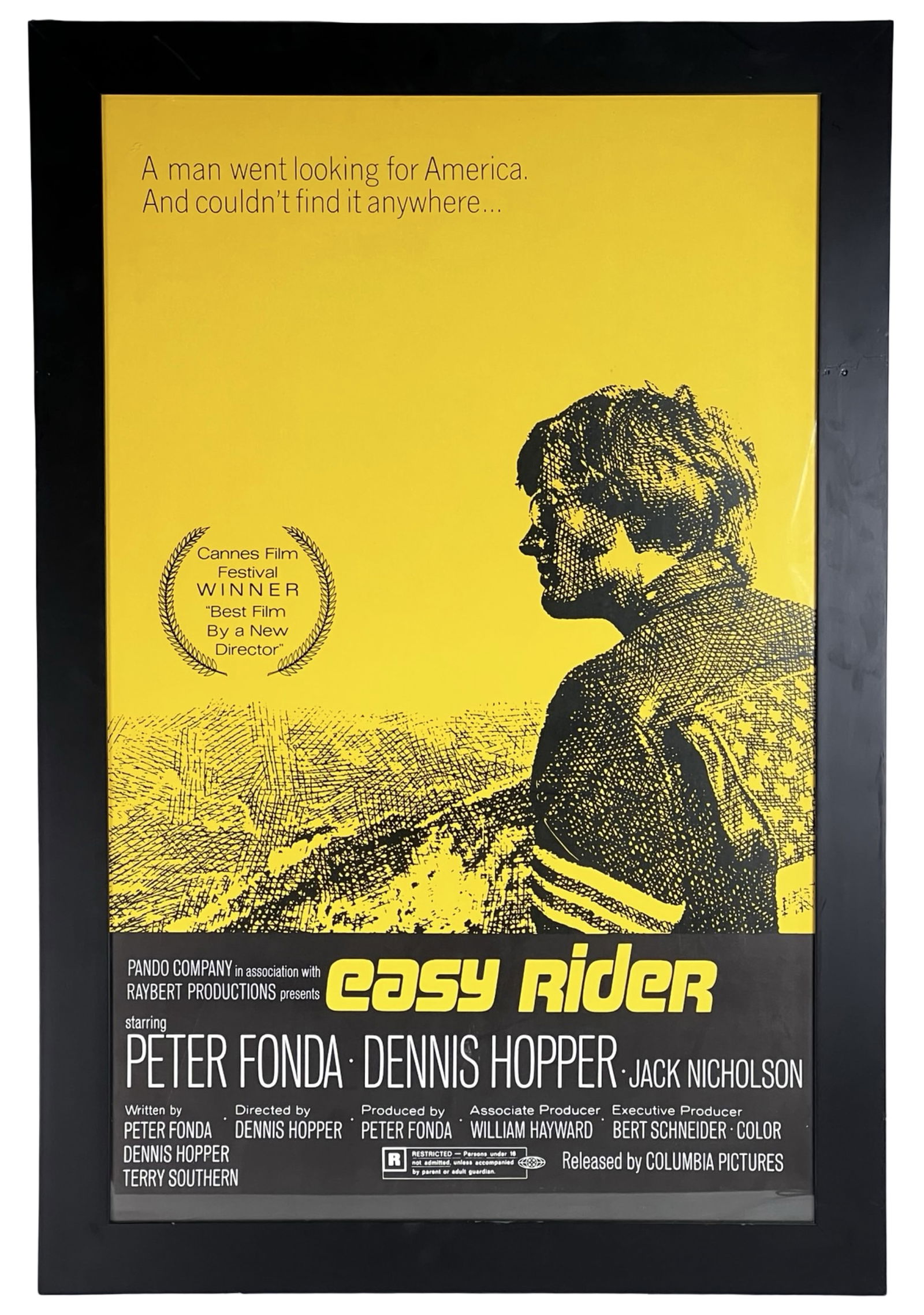Easy Rider - 1969 Framed Movie Poster: Striking framed poster for the landmark 1969 counterculture film Easy Rider, starring Peter Fonda, Dennis Hopper, and Jack Nicholson. Featuring the iconic yellow-and-black design with the memorable ta