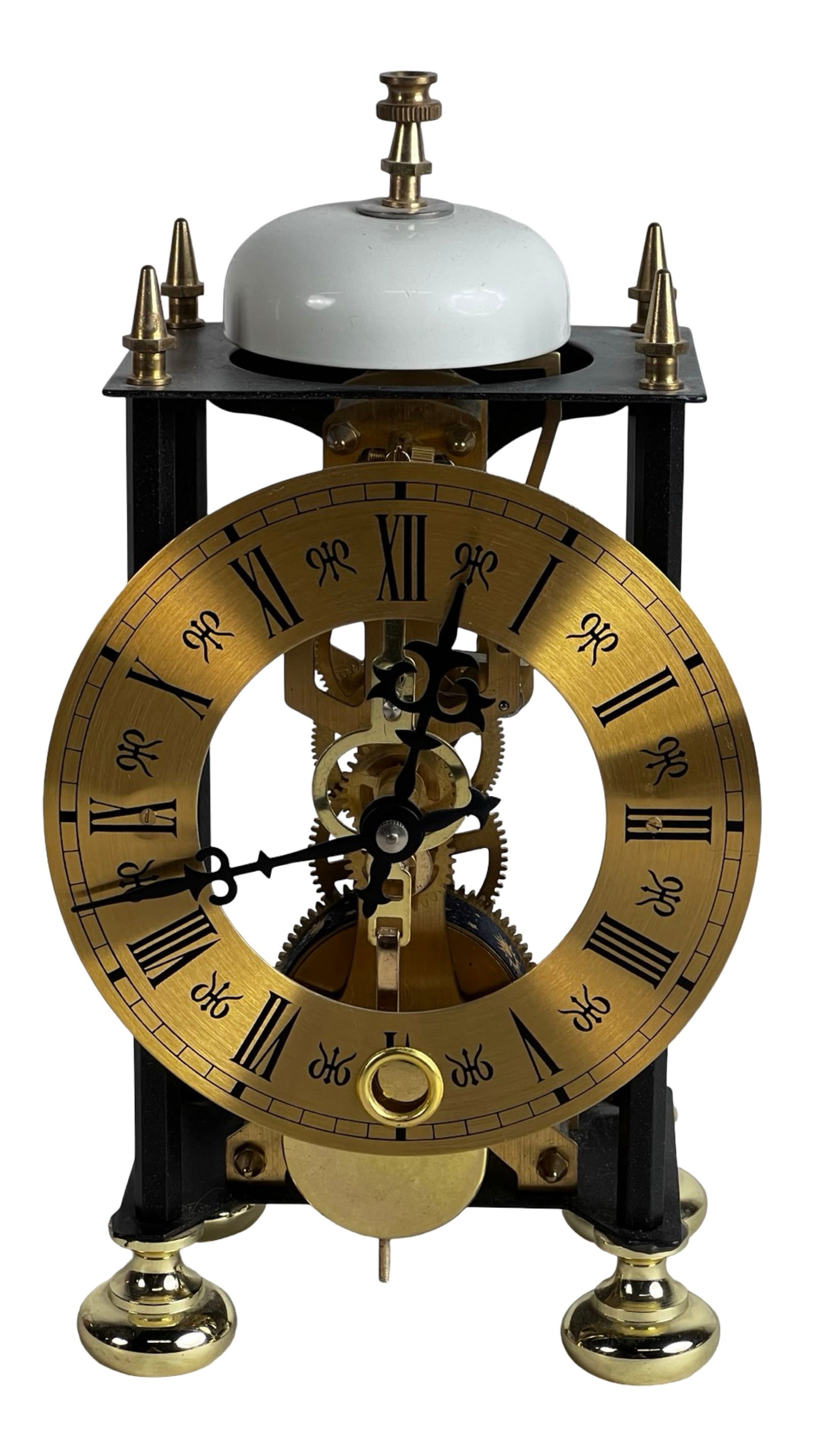 Vintage Style Skeleton Mantel Clock w/ Brass Dial: Vintage-style skeleton mantel clock featuring an open-work design that showcases its intricate brass movement and gearing. The circular brass-tone dial is accented with black Roman numerals and decora