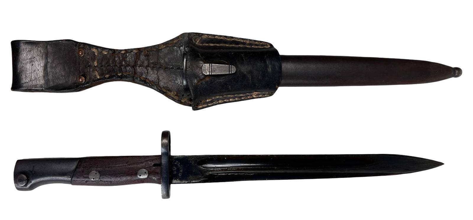 WWII K98 Mauser Bayonet with Scabbard & Frog: World War II-era Yugoslavian K98 Mauser bayonet marked "Preduzece 44," complete with original metal scabbard and leather frog. The blade measures approximately 10 inches in length with an overall