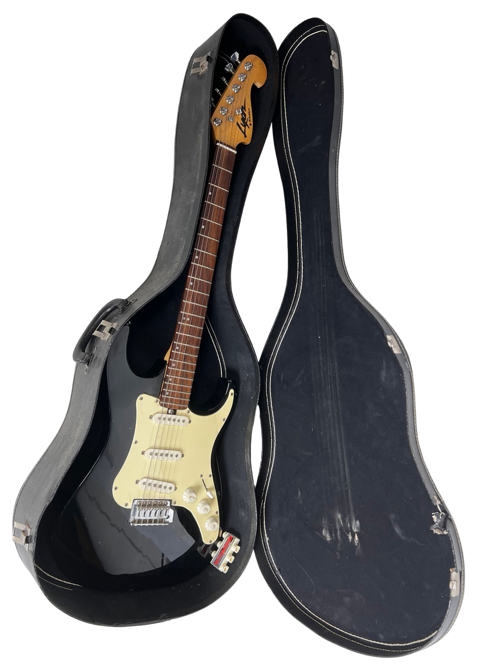 Lyon by Washburn Electric Guitar with Hard Case: Solid-body Lyon by Washburn electric guitar finished in black with a cream pickguard and three single-coil pickups in a classic S-style configuration. Features include a bolt-on maple neck, rosewood