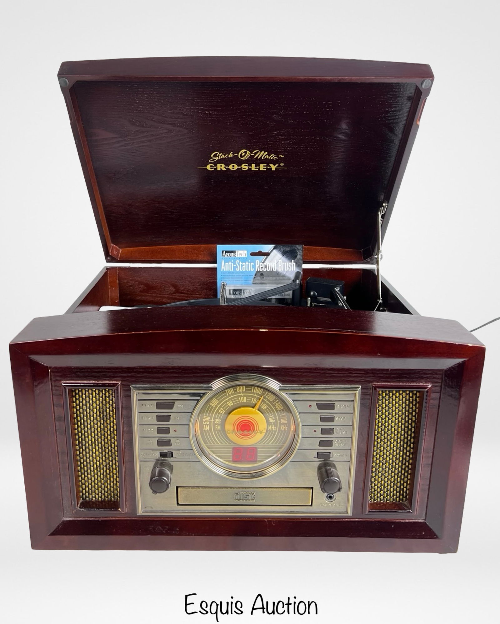 Crosley Stack-O-Matic CR83 Record Changer System: Crosley Stack-O-Matic CR83 "The Centurion" record changer system housed in a cherry-finished cabinet with classic vintage styling. This Arlington model features a hinged top lid, decorative front spea