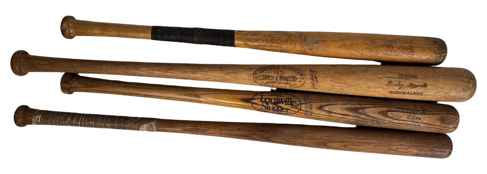 Four Vintage Player Model Baseball Bats- Mantle, B: Group of four vintage wooden baseball bats including a Louisville Slugger Yogi Berra player-model bat, a Louisville Slugger Mickey Mantle bat, a Louisville Slugger "Batting Champion" Tony Oliva bat, a