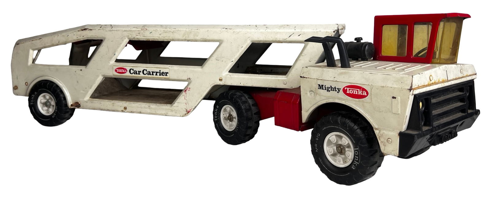 1970s Mighty Tonka Car Carrier Pressed Steel Truck: Classic vintage Mighty Tonka Car Carrier from the 1970s, crafted in durable pressed steel with the bold styling that made Tonka trucks a childhood favorite. This substantial piece features the white a