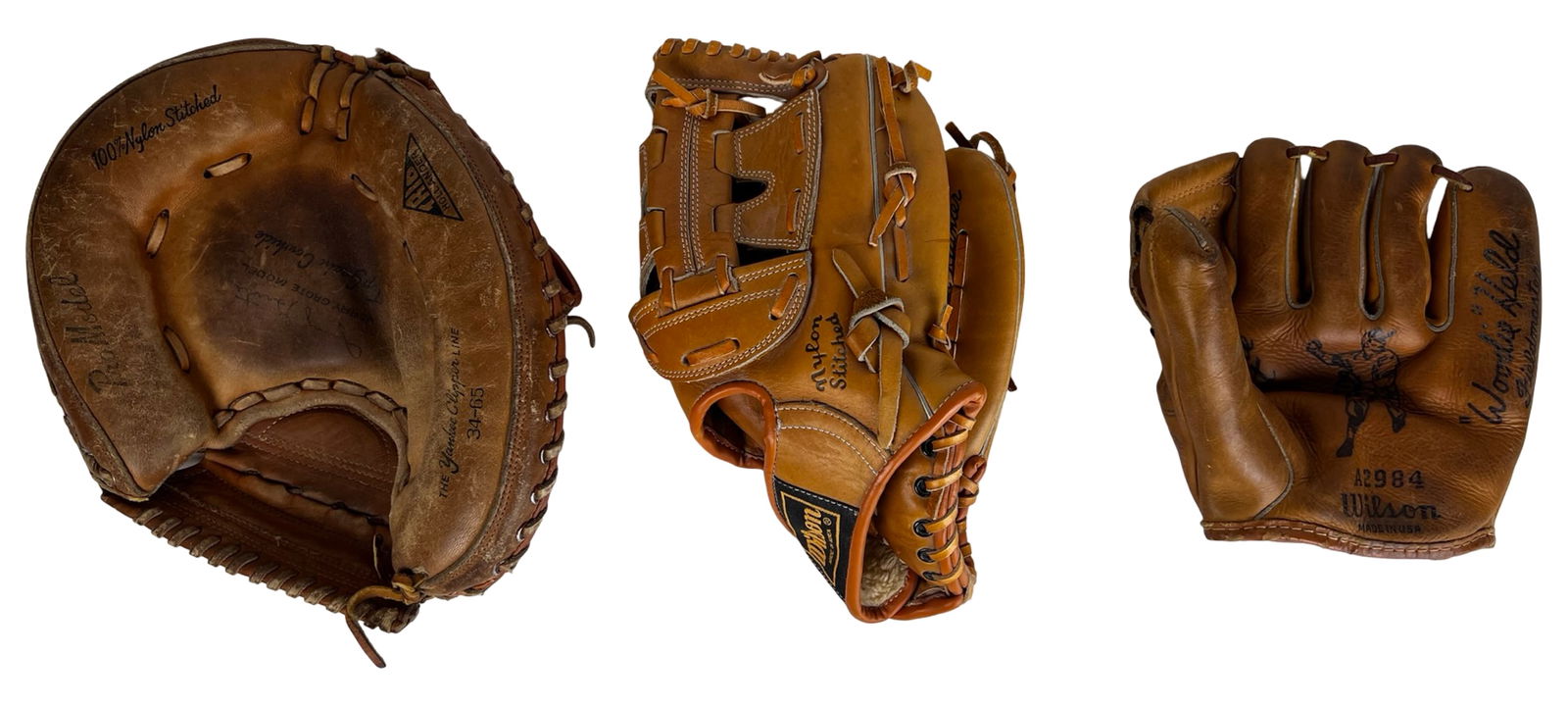 1960s-1970s Vintage Baseball Glove Trio: Group of three vintage baseball gloves dating from the 1960s to early 1970s, featuring well-known player-endorsed models.Included is a 1960s Trio Hollander Jerry Grote catcher's mitt, marked "100%
