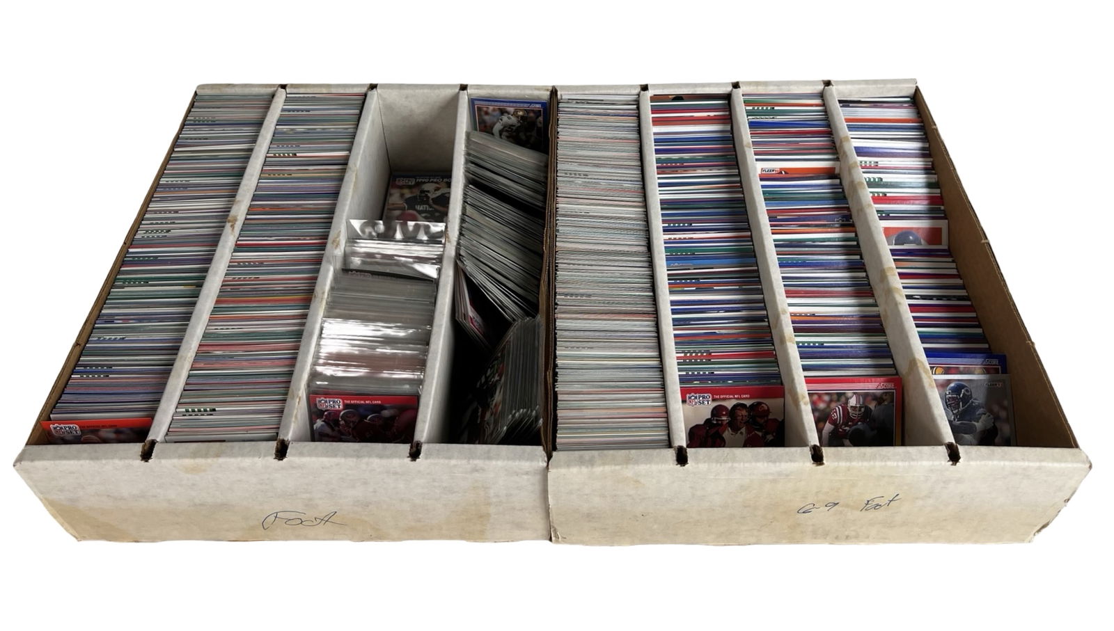 2 Jumbo Boxes of Vintage Unsearched Football Cards: Large accumulation of vintage football trading cards housed in two full-size storage boxes. The collection spans multiple brands and series, with cards appearing to date primarily from the late 1980s