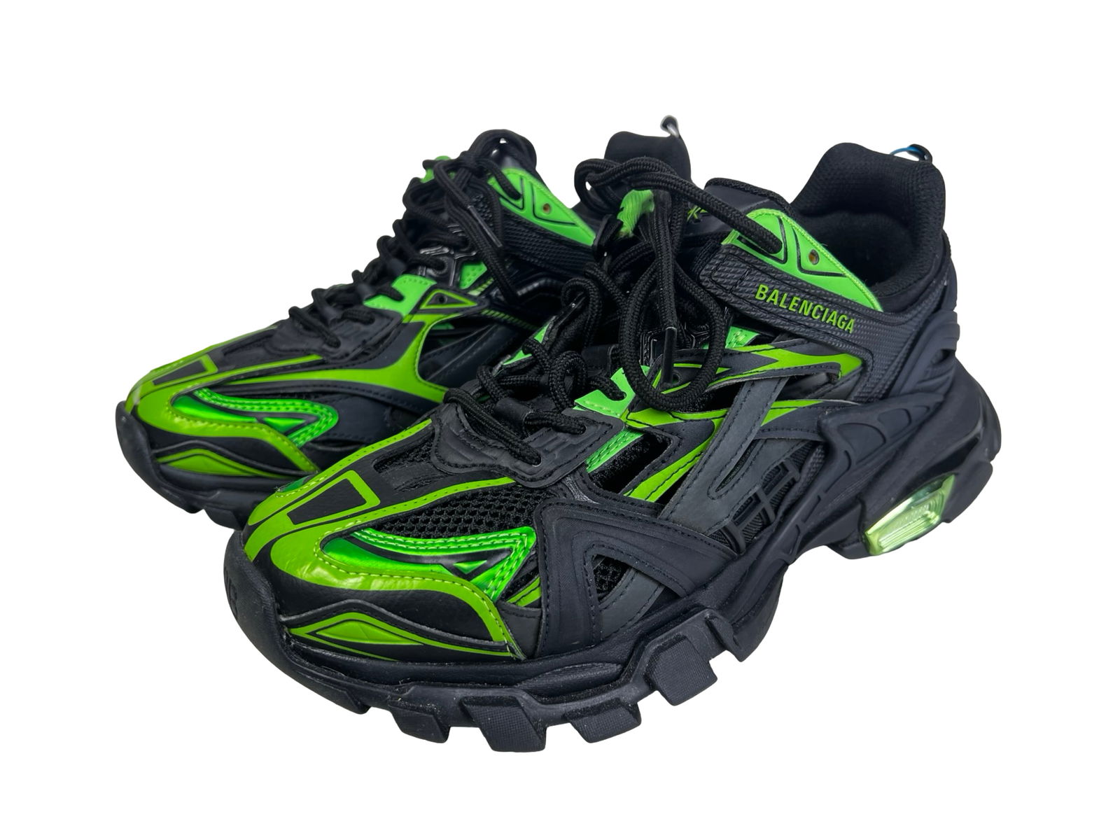 Balenciaga Track.2 Sneakers eBay Authenticated: Balenciaga Track.2 sneakers in striking black and neon green colorway. These statement-making designer trainers feature the signature layered construction, mesh and synthetic paneling, oversized