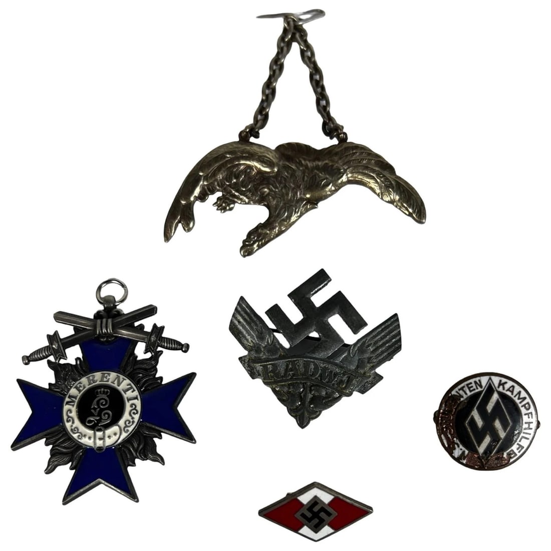 World War II-Era European Badges and Insignia: This mixed group of mostly World War II-period European badges and insignia represents a range of military, youth, and auxiliary organizations from the era. The collection includes a Polish Air Force