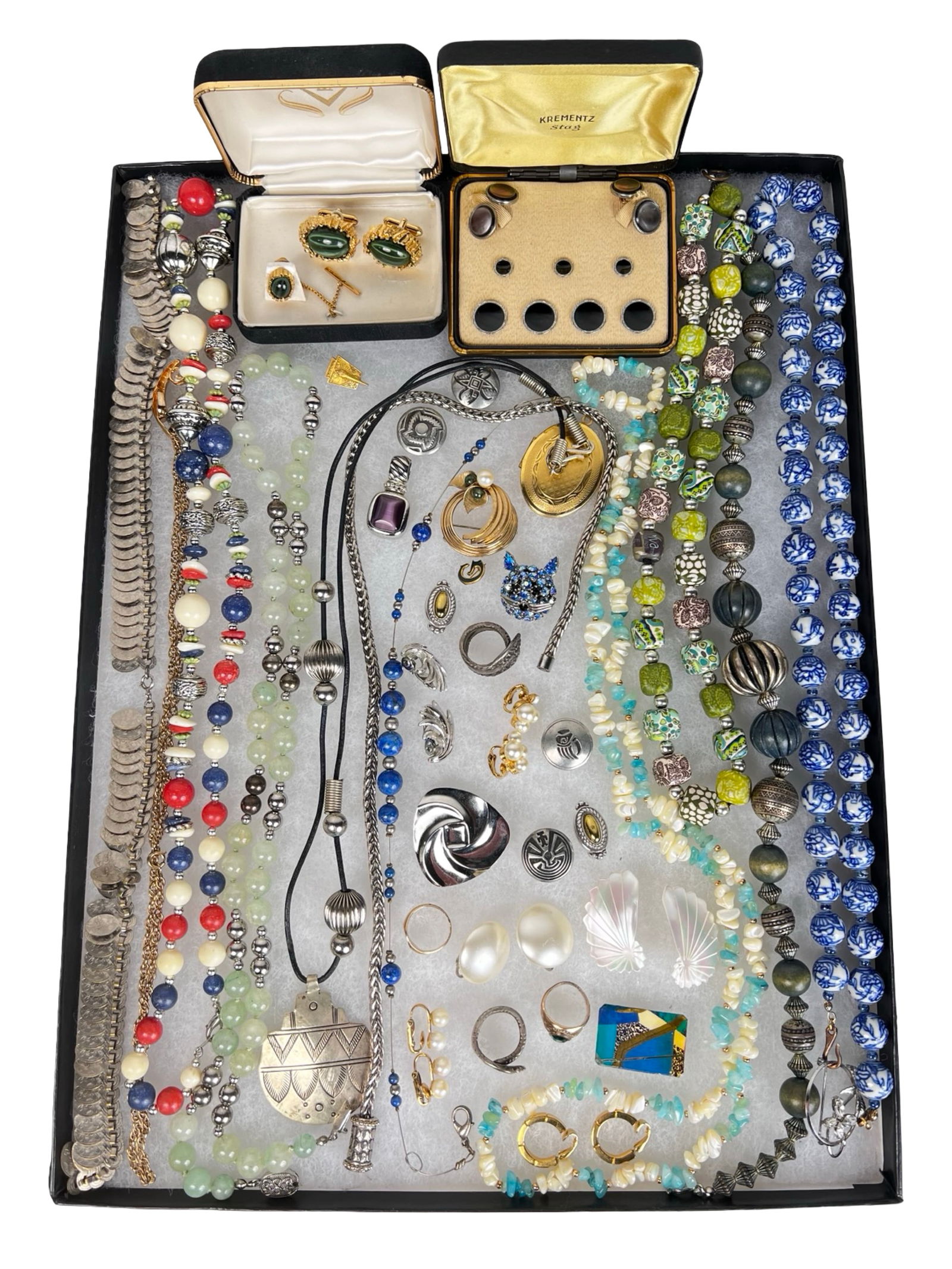 Assortment of His & Hers Vintage Jewelry: Large assortment of his and hers vintage jewelry featuring necklaces, beaded strands, clip and pierced earrings, rings, brooches, cufflinks, and statement pieces in a variety of materials and