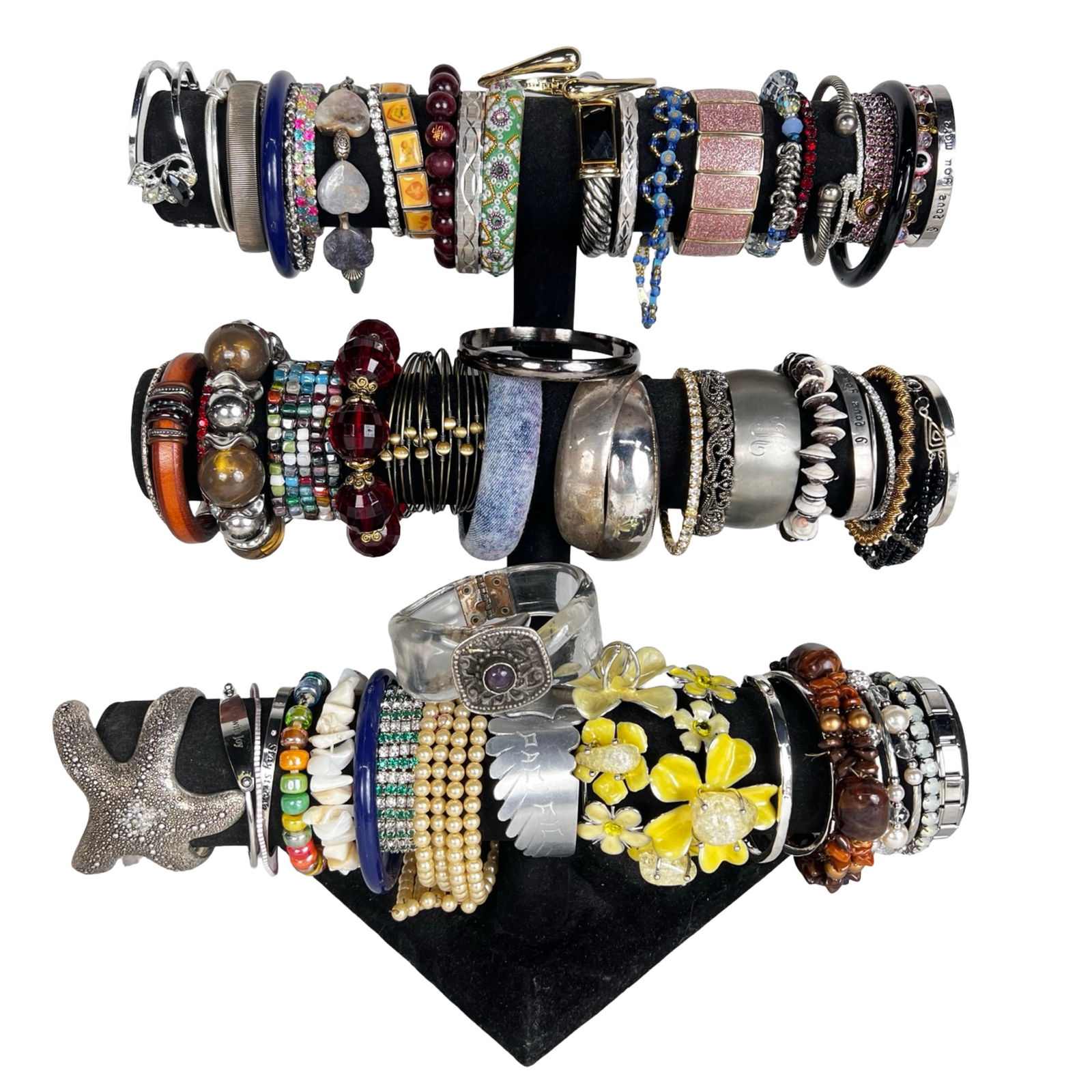 Collection of Lady's Bracelets: Explore a diverse assortment of bracelets, each one offering its own unique style and charm. Display stand is not included.