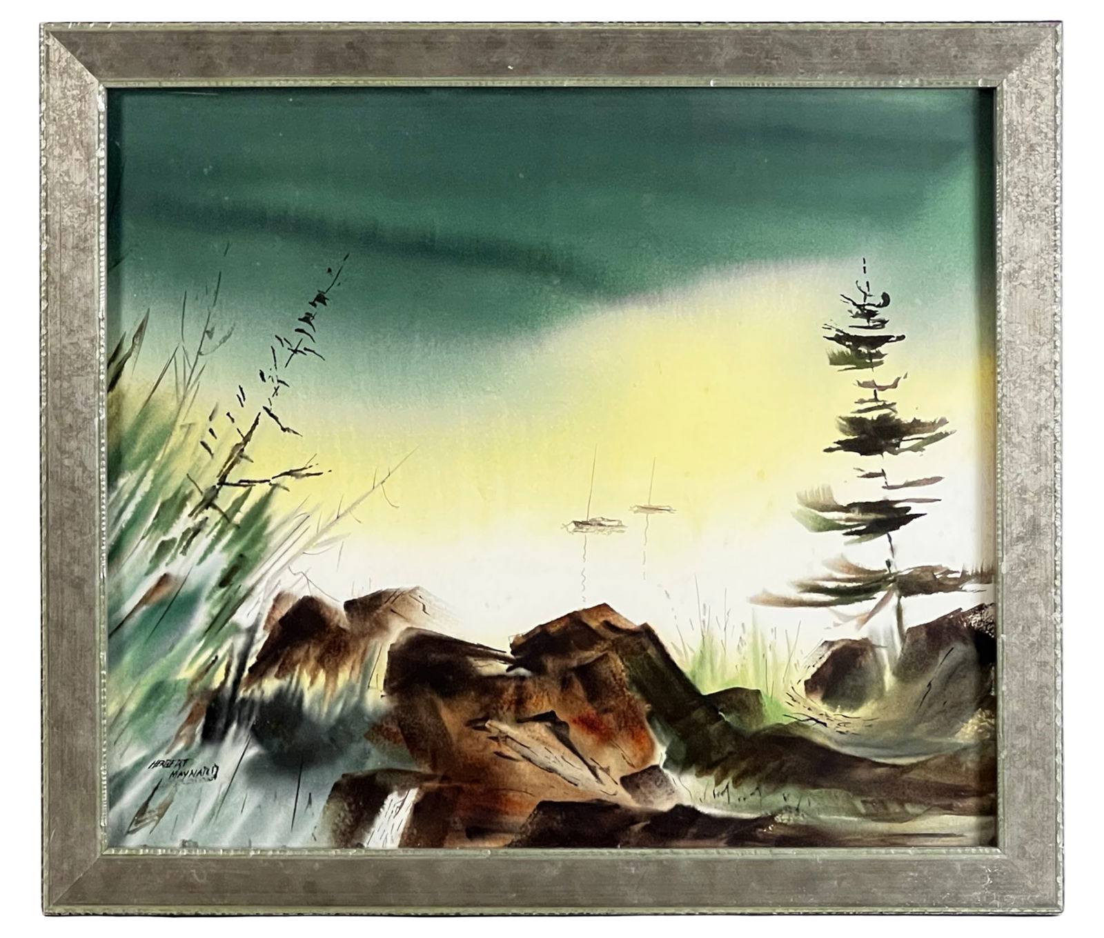 Herbert Maynard- Lakeside Landscape Watercolor: Expressive watercolor landscape by Herbert Maynard, signed lower left. The composition depicts a tranquil lakeside scene with rocky foreground, soft reeds and grasses at left, and a lone evergreen ris