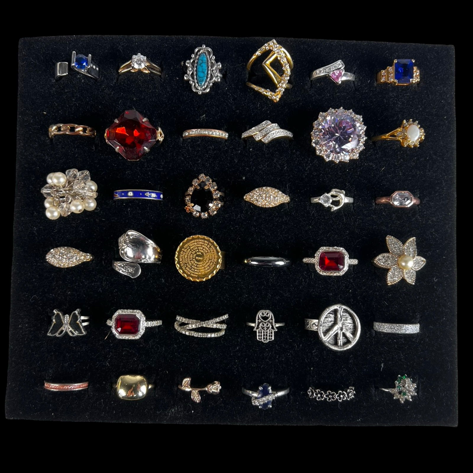 Exquisite Collection: Set of 36 Various Rings: Explore a wide range of styles and periods with this impressive group of 36 rings, each showcasing its own distinctive design and appeal. Spanning classic silhouettes to bold contemporary looks, this