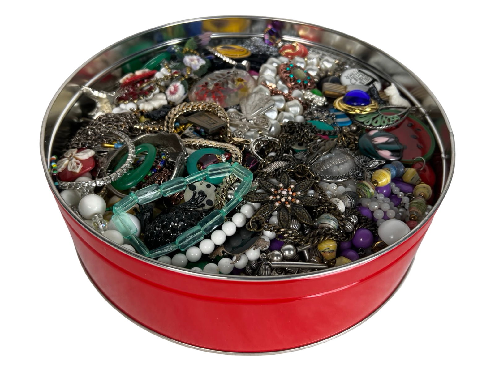 Box Filled with Unsearched Costume & Craft Jewelry: A generously filled box featuring an eclectic assortment of costume and craft jewelry. This varied mix includes necklaces, bracelets, brooches, pendants, beads, and other decorative pieces, making it