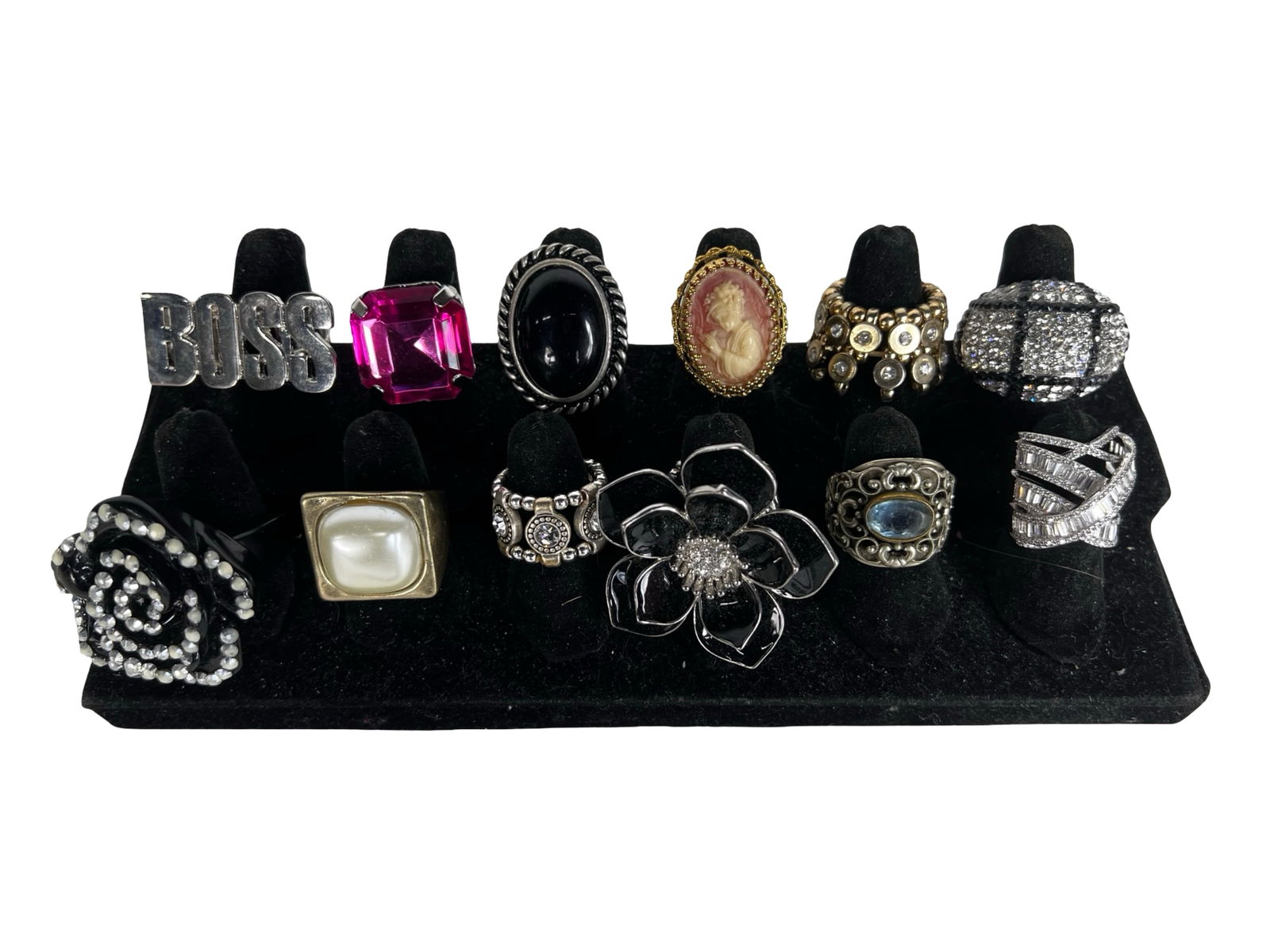 Collection of Lady's Costume Jewelry Rings: Experience classic style with this thoughtfully assembled collection of vintage ladies costume jewelry rings. The group showcases a variety of designs, offering a charming mix of eras and aesthetics t