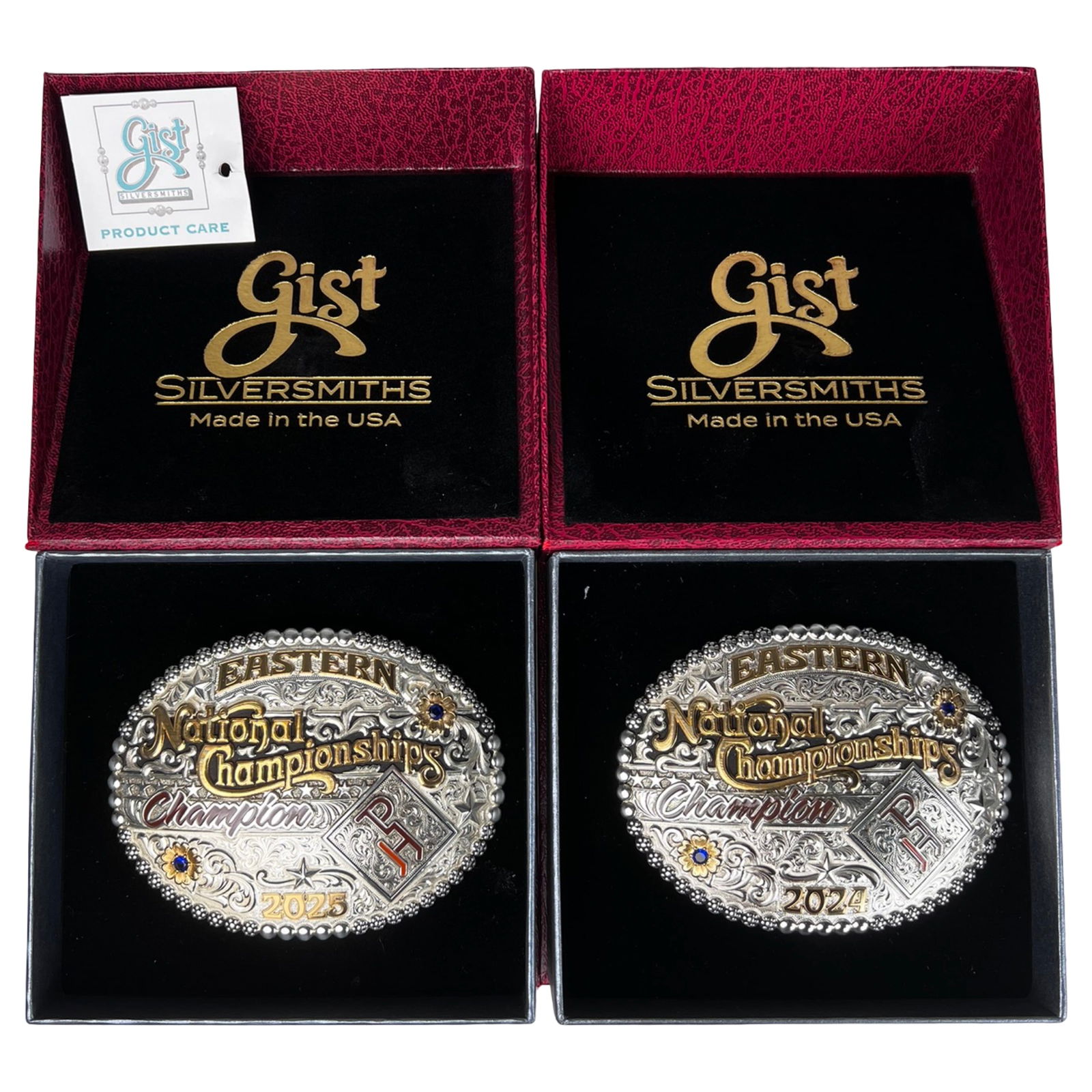 Gist Eastern National Championship Belt Buckles: This matching set of championship belt buckles by Gist Silversmiths celebrates the Eastern National Championships for the years 2024 and 2025. Each buckle showcases finely detailed Western scrollwork