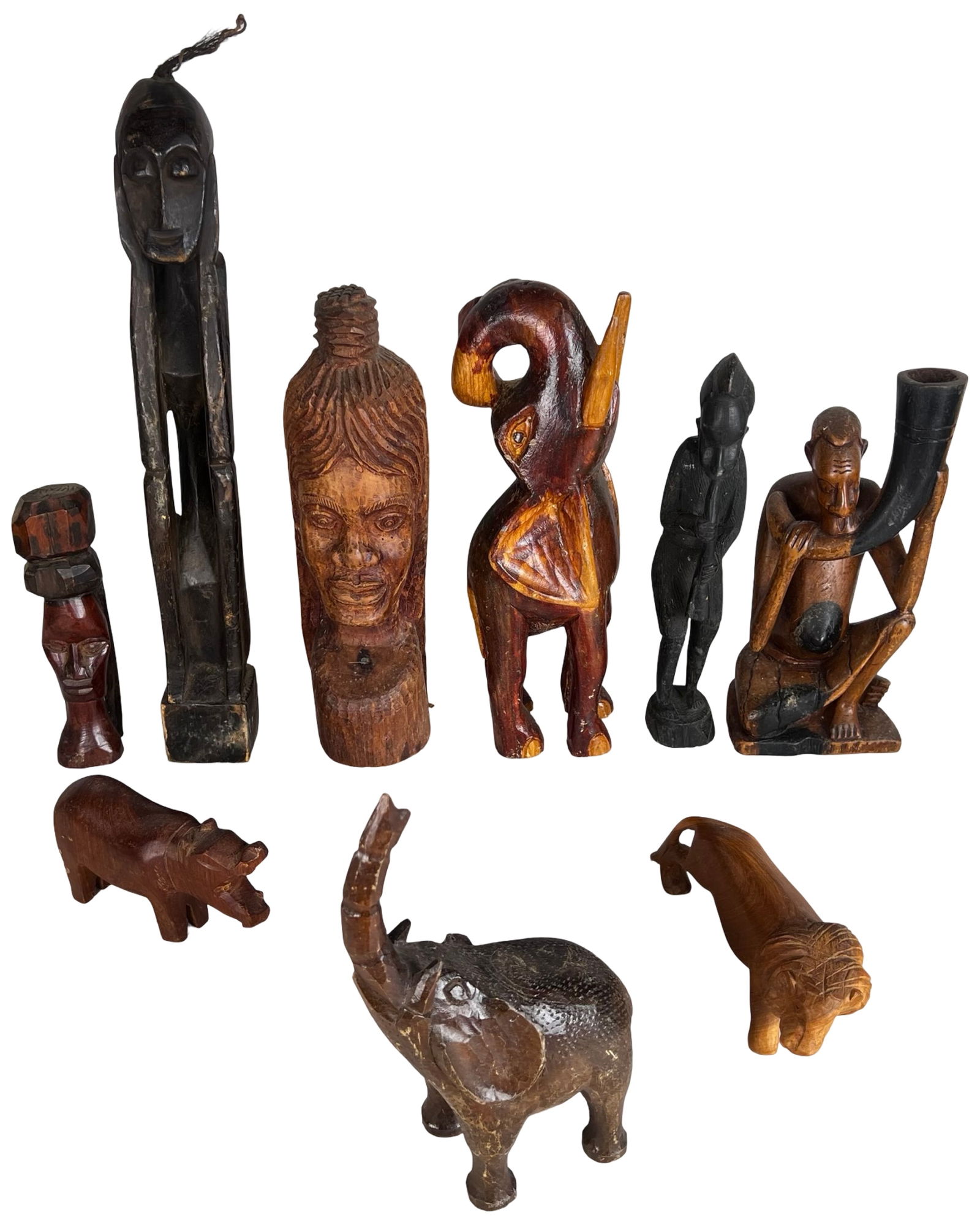 Hand Carved African Wood Figures & Animals: Collection of African hand carved wood figures and animal sculptures. Tallest figure measures approximately 20 inches high. An appealing and visually diverse grouping suitable for collectors of