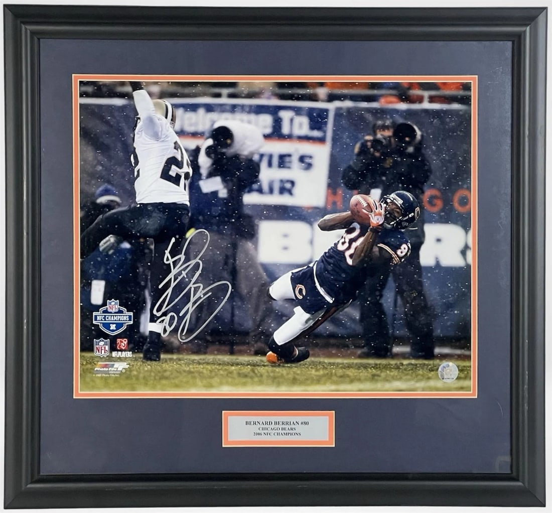Bernard Berrian Signed Chicago Bears Photograph: Dynamic autographed photograph of Bernard Berrian (#80) from the Chicago Bears' 2006 NFC Championship season. The image captures Berrian's remarkable sideline catch in snowy conditions, showcasing