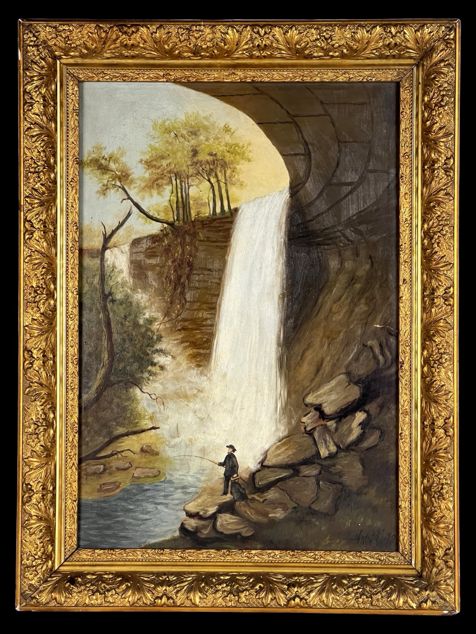 1893 Antique Waterfall Landscape Oil Painting: Late 19th-century American School oil painting on canvas depicting a dramatic waterfall cascading from a stone arch or cliffside into a quiet pool below. A solitary fisherman stands along the rocky