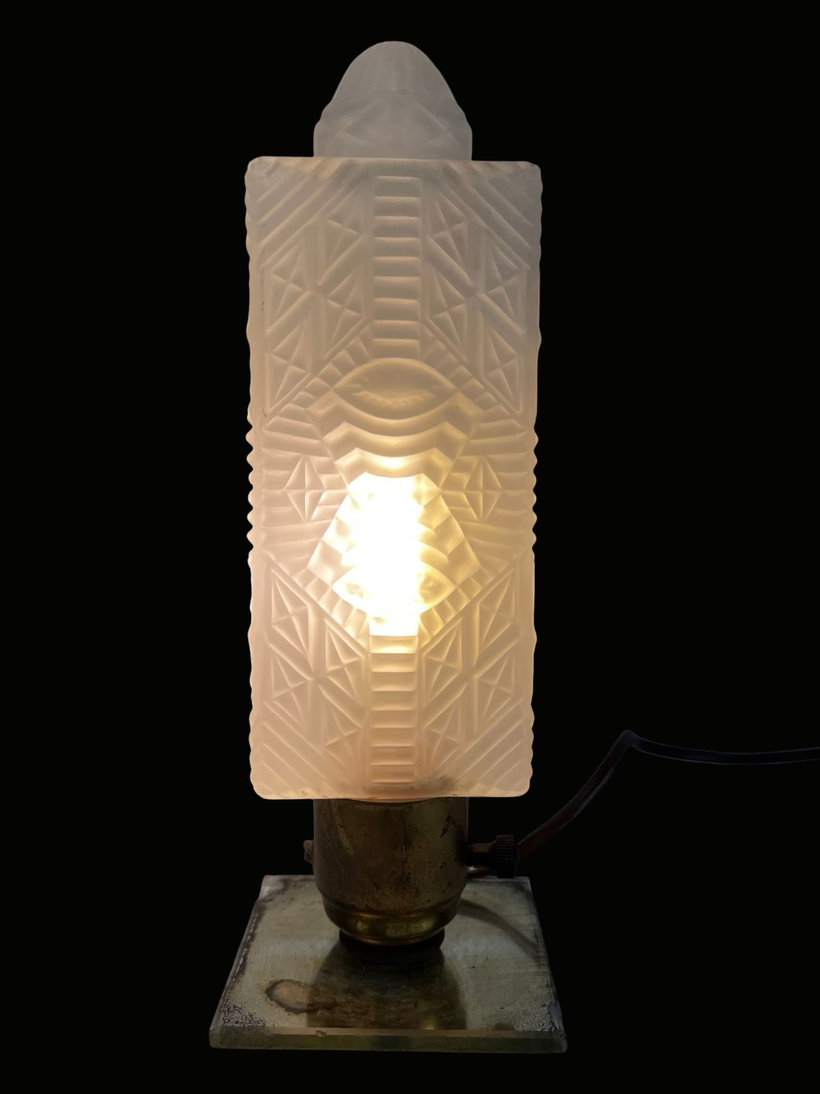 1930s Art Deco Skyscraper Boudoir Lamp: Elegant 1930s Art Deco boudoir or desk lamp featuring a striking skyscraper-style frosted glass shade. The geometric pressed glass design displays classic Deco motifs with stepped architectural