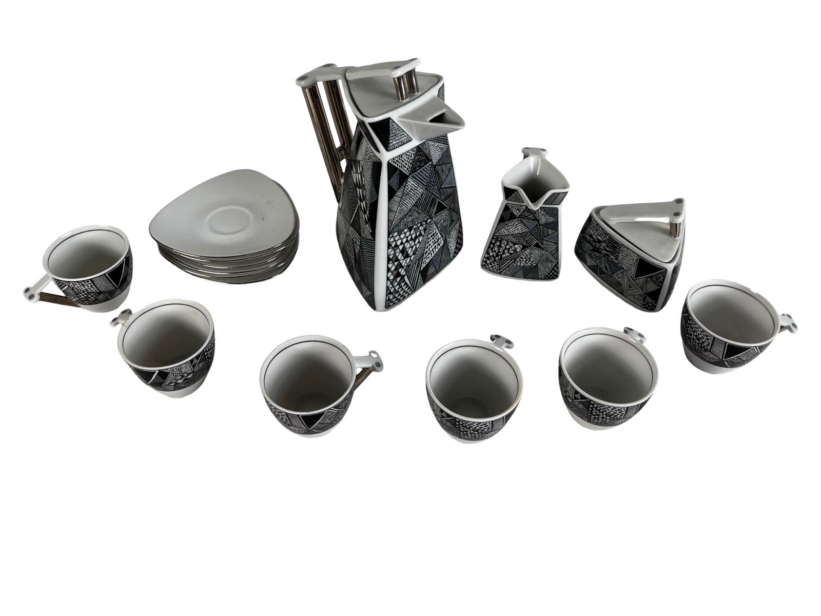 Thun Studio Delta Czech Postmodern Coffee Tea Set: Striking vintage Thun Studio Delta porcelain tea or espresso service featuring bold black-and-white geometric decoration and sculptural angular forms typical of Postmodern design. The set displays a
