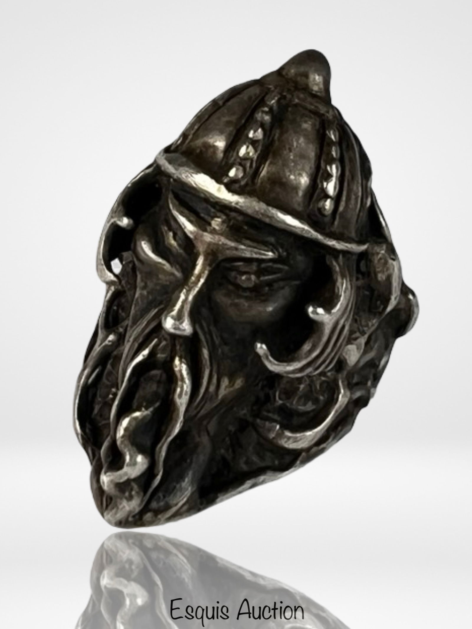 Sterling Silver Genghis Khan Warrior Head Ring: Striking sterling silver ring featuring a sculptural depiction of Genghis Khan, the legendary Mongol warrior and empire founder. The detailed design portrays the fierce ruler wearing a traditional
