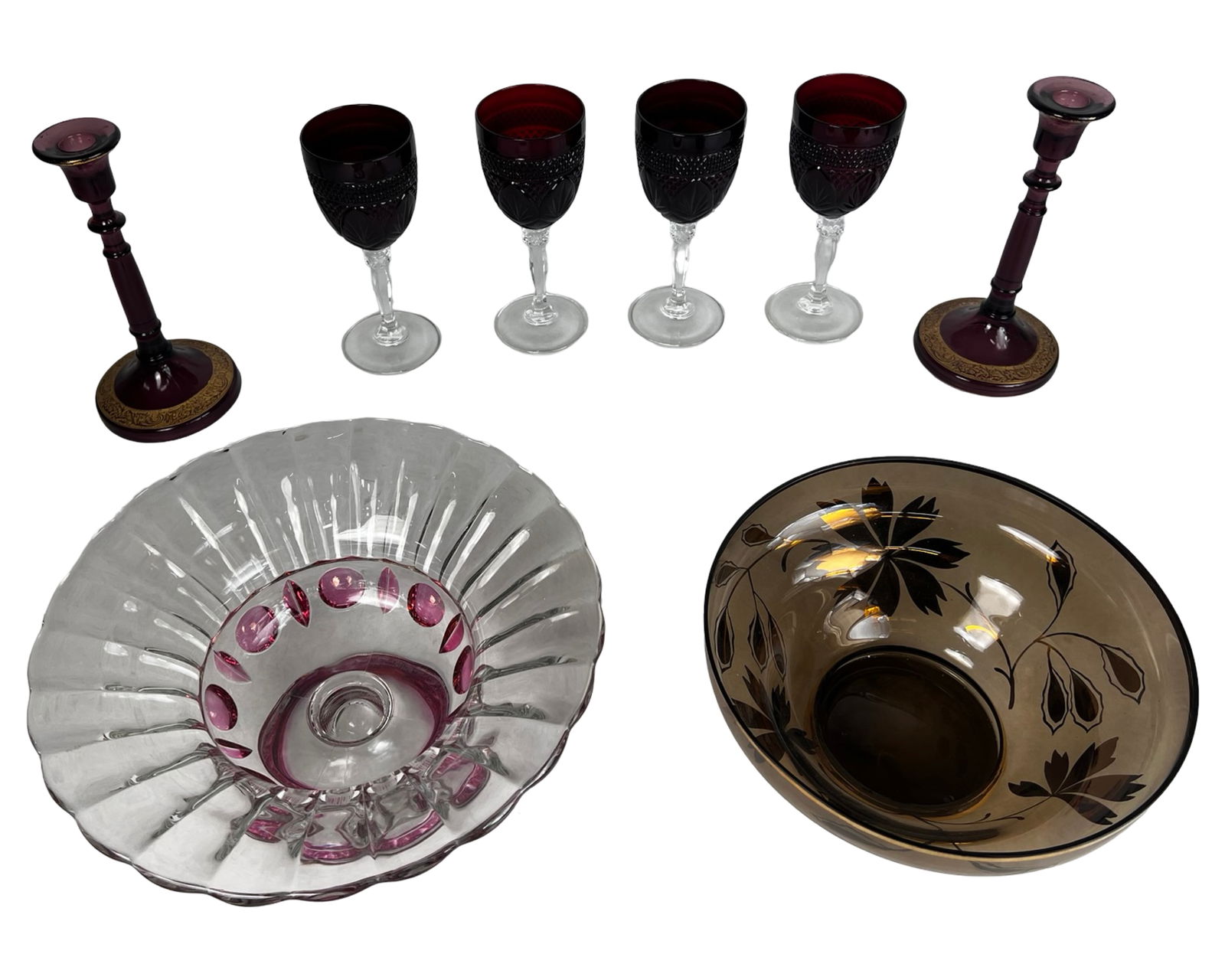 Decor Glass Group - Ruby Stemware, Etched Bowl,: Group of decorative glassware including four ruby-colored cut-to-clear wine goblets with clear stems, a pair of deep ruby glass candlesticks with gilt-decorated bases, a clear and cranberry flashed