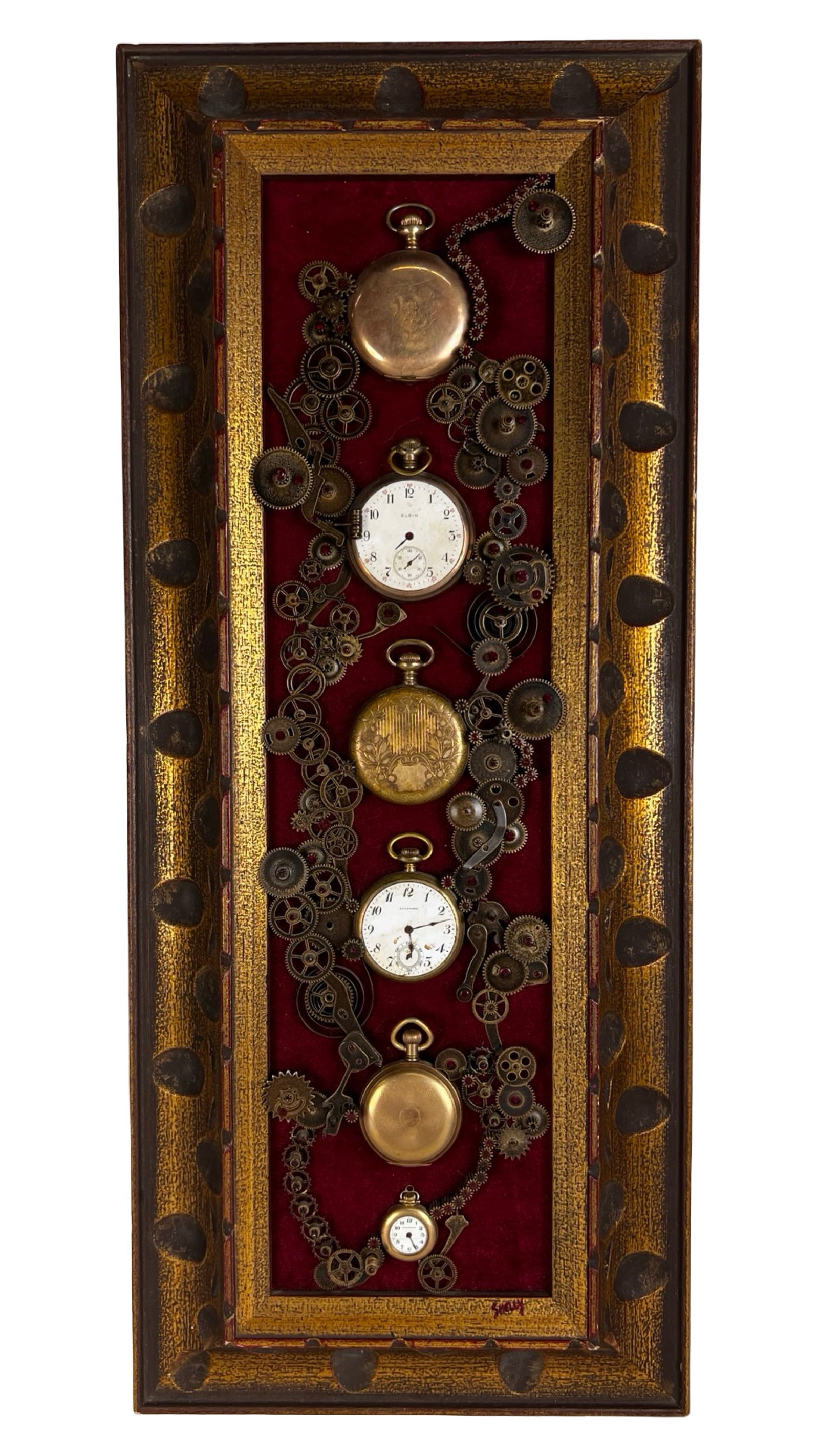 One-of-a-Kind Steampunk Pocket Watch Wall Art: One-of-a-kind steampunk assemblage wall art featuring antique Gold Filled pocket watches, watch movements, and mechanical components arranged in a vertical composition against a rich red velvet