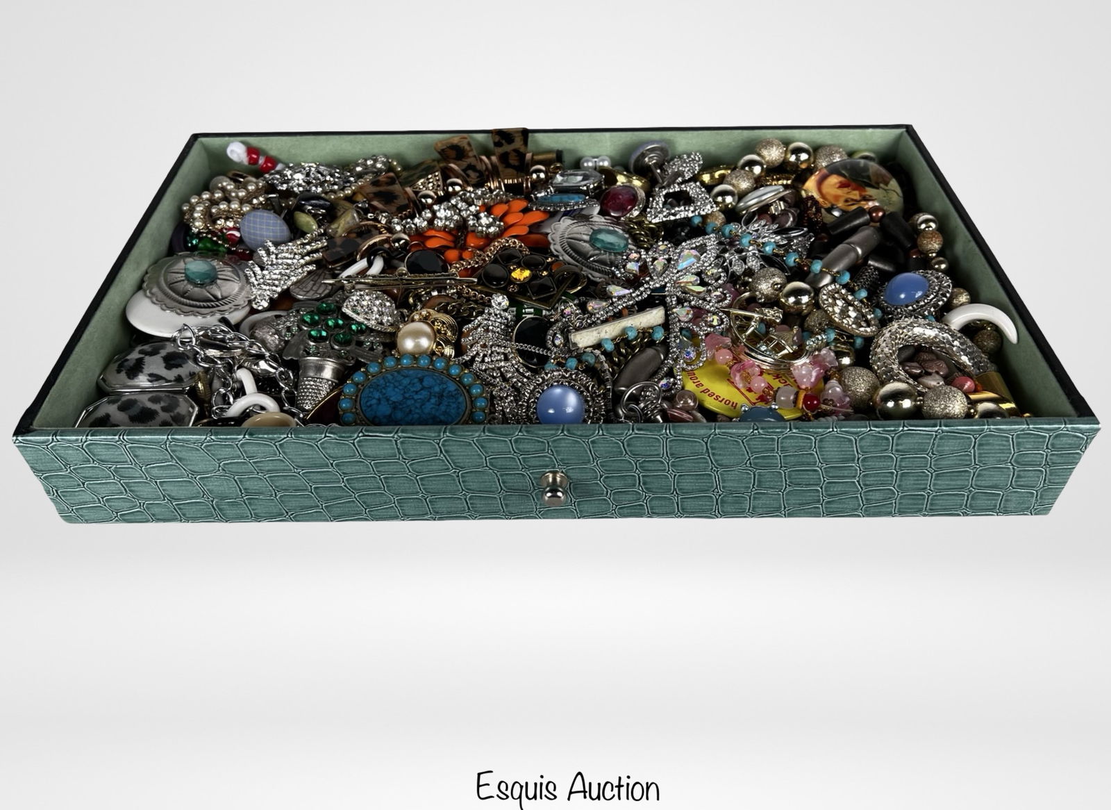 Assortment of Unsearched Costume & Craft Jewelry: Large mixed assortment of unsearched costume and craft jewelry including brooches, necklaces, bracelets, pendants, charms, and assorted decorative pieces. The group features a wide variety of