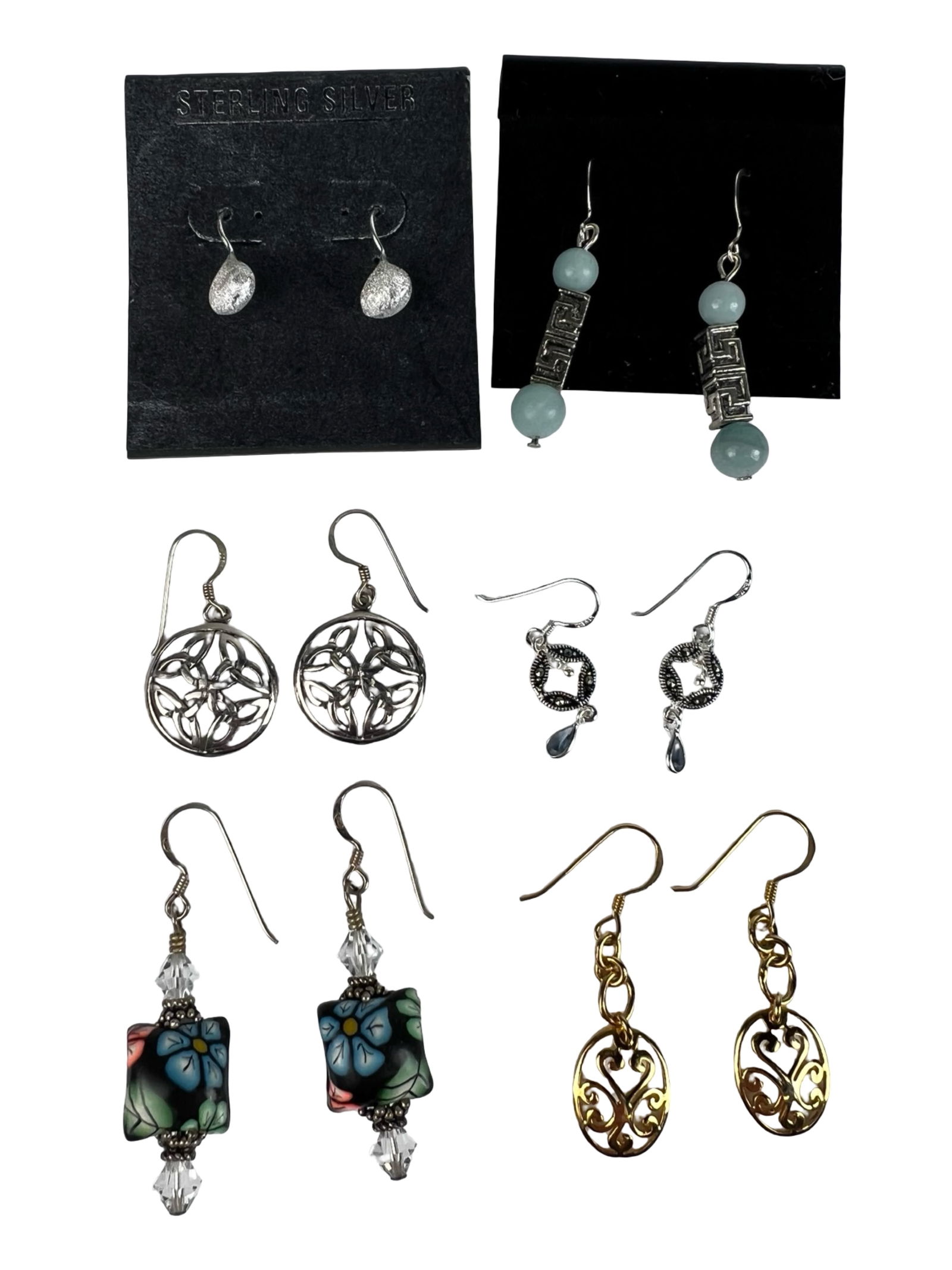 Sterling Silver Earrings- Dangle & Drop Designs: Attractive assortment of sterling silver earrings featuring a variety of styles, including classic drops, openwork circular designs, bead accented examples, and decorative dangle forms. Several pairs