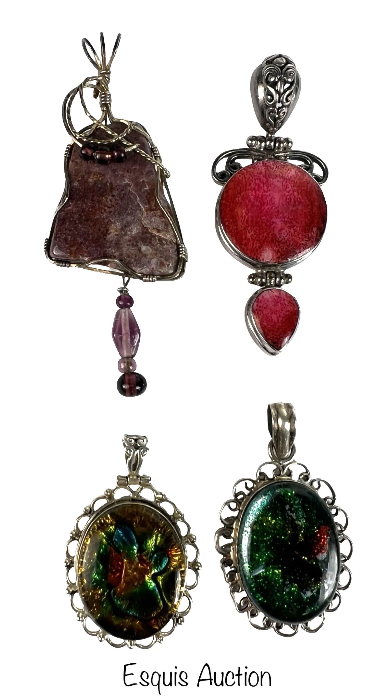 Sterling Silver Statement Pendant Group: Striking collection of sterling silver statement pendants featuring a mix of natural stone and art glass elements. The group includes four distinctive pieces, each with its own bold presence and handc