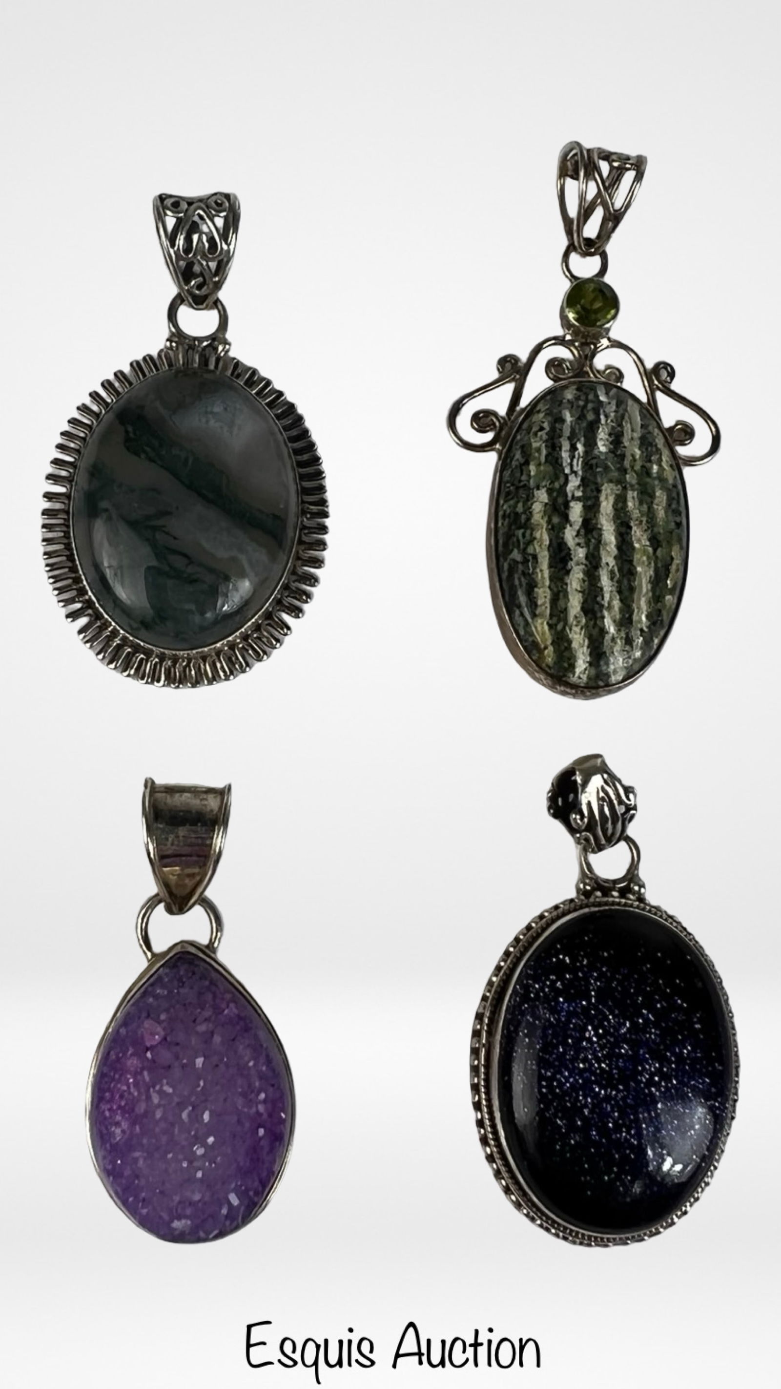 Sterling Silver Statement Pendants- Stones & Druzy: Collection of sterling silver pendants featuring a variety of bold, eye-catching designs. The group includes oval and teardrop forms set with natural stones such as dendritic agate, banded green