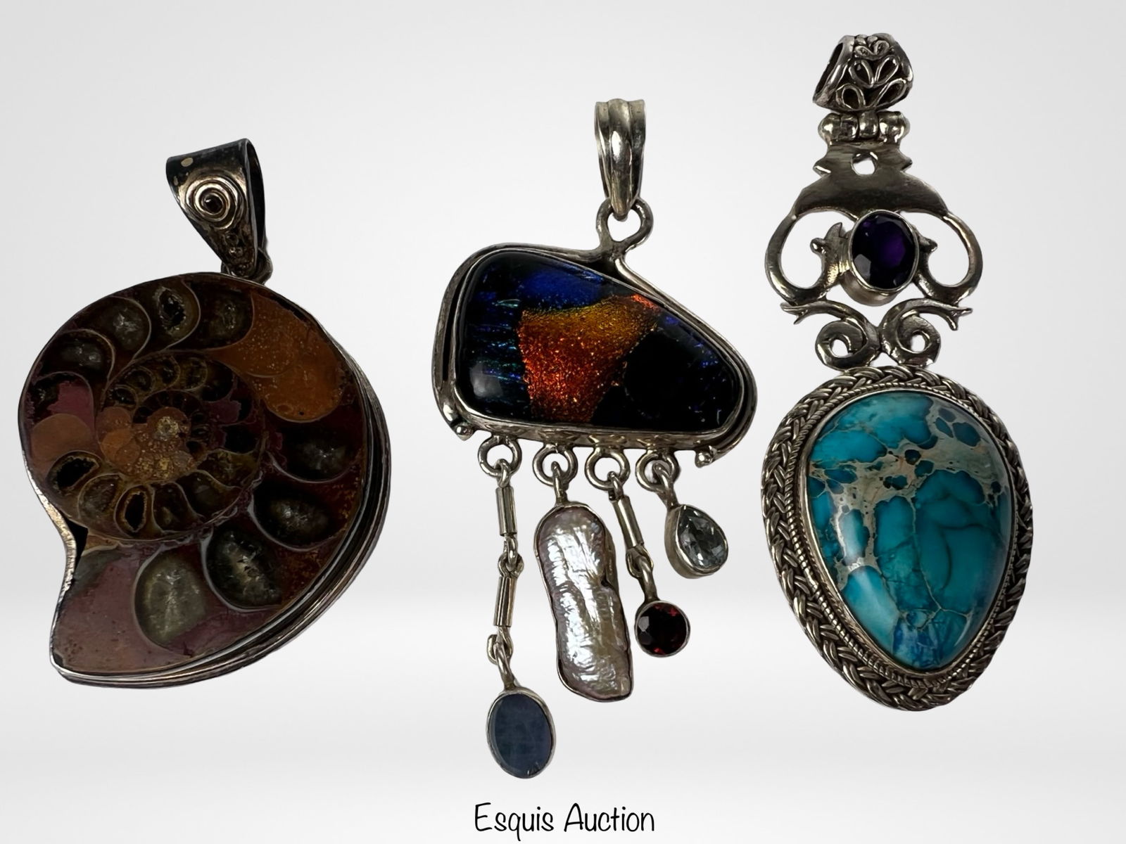 Massive Sterling Silver Statement Pendant Group: Bold grouping of large sterling silver pendants featuring striking natural and decorative elements. Includes an ammonite fossil pendant with rich earthy tones, a turquoise pendant with pronounced