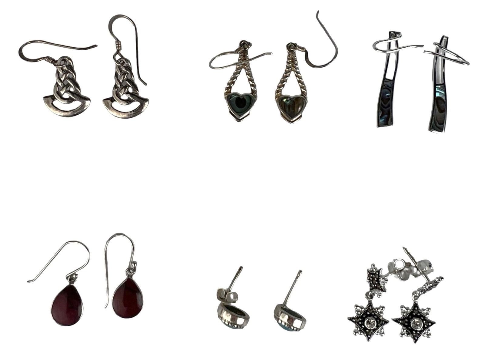 Lot of Sterling Silver Earrings -Gemstones & Inl: Attractive assortment of sterling silver earrings featuring a variety of styles and decorative elements. Includes drop and dangle forms with braided motifs, heart-shaped accents, abalone shell inlay b