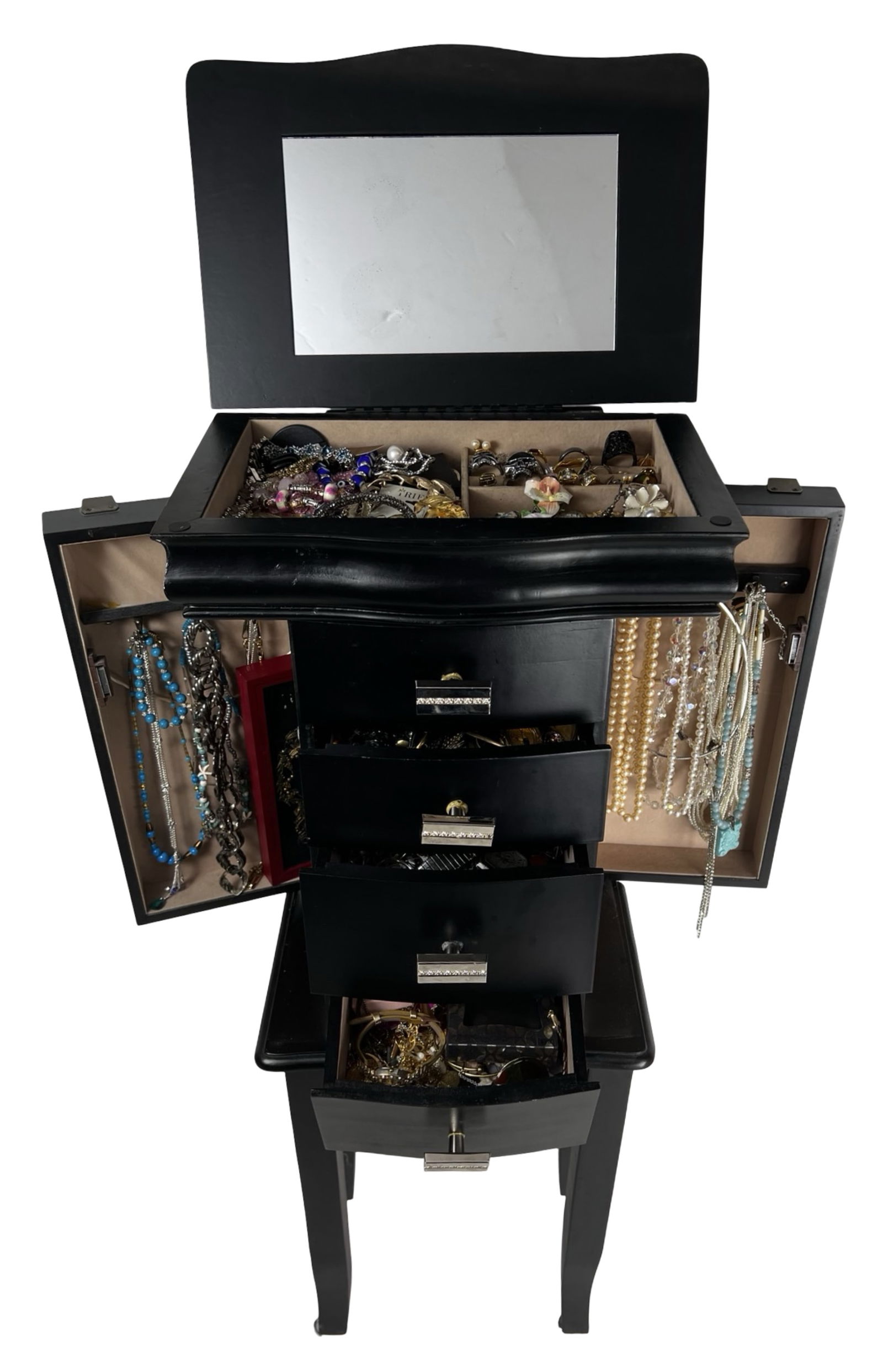 Jewelry Armoire Overfilled w/ Unsearched Treasures: Black finished standing jewelry armoire featuring hinged side compartments, multiple drawers, and a lift-top mirror compartment, filled with a large assortment of unsorted jewelry.Contents include a