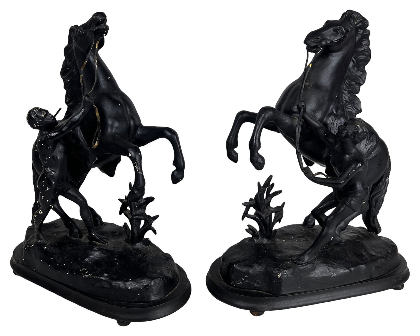 Guillaume Coustou (after) Marly Horses Sculptures: Striking pair of classical-style metal sculptures modeled after the famed "Marly Horses," originally created by French sculptor Guillaume Coustou. Each piece depicts a powerful rearing horse